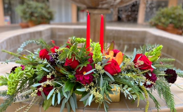 By the Candlelight Centerpiece - Let time fly By the Candlelight centerpiece as new holiday memories are made. What better way to commemorate the joyful homecoming.