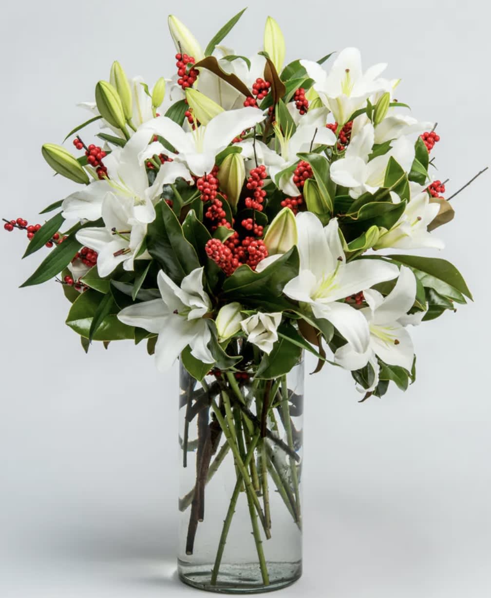 Christmas Classic  - A timeless classic, this luxurious collection of white lilies, making for a gorgeous display of understated opulence.
