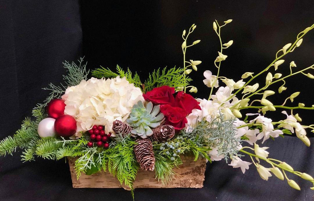 Winter Charm - Elevate your holiday tablescape or mantle with a low and lush design perfect for entertaining. 