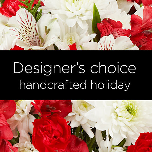 Christmas Designers Choice 65 - Let our expert florists work their magic with the Designer's Choice Christmas Arrangement and spread Christmas cheer this holiday season with flowers! Send the ones you love a beautiful gift of glad tidings and peace. As Santa’s little helpers, we’ll be sure to make them something that emulates the magic of Christmas. They’ll love receiving this gift, even if it’s not under the tree!  Crafted with the freshest flowers, this arrangement is a perfect seasonal design for Christmas. Trust us to create the ideal arrangement that captures the spirit of the holiday season, with our meticulous attention to detail and commitment to quality.  PLEASE NOTE: Designer's Choice product image does not necessarily reflect the finished item. This product consists of seasonal, market-fresh flowers, which will vary by the day.