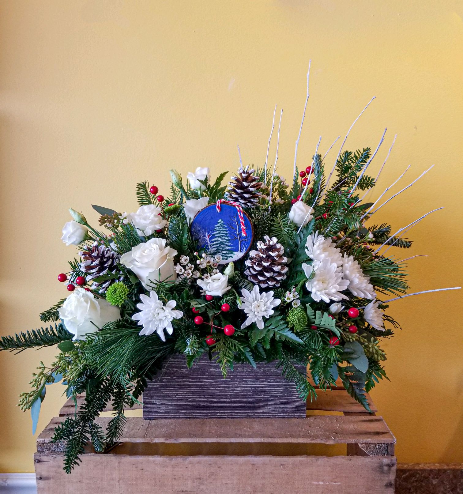 Merry Christmas,  Evy - ***Support a local artist *** Looking for that special and unique gift ?  Know anyone that collects Christmas tree ornaments ? One of our wonderful designers is also a budding artist and crafter.  She has incorporated one of her new seasonal pieces into this amazingly beautiful arrangement.   You can also visit her via social media Etsy shop, instagram or facebook for other great unique gift ideas.   https://www.etsy.com/shop/EverythingEvyUS https://www.instagram.com/everything_evy_art/ https://www.facebook.com/profile.php?id=100073663632171  The Arrangement measures: 21x23