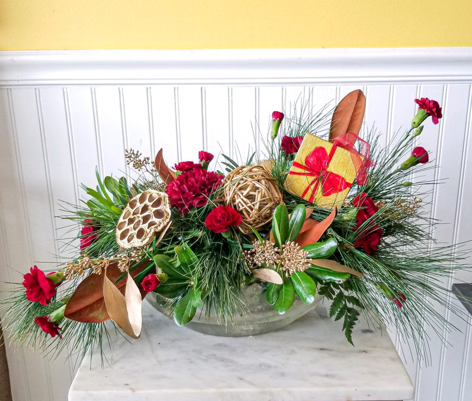 Painted Expressions - Holiday Present - Looking for something special ? We have teamed up with a local artist Stefanie Snapp, to include some of her exquisite , one of a kind, hand painted pieces. All art pieces are unique, and thus may not be exactly as pictured, however they are all similar presents. The hand painted ornament piece is 3 x 3  stretched canvas. This floral arrangement is designed in a floral glass dish with winter greens and red/burgundy blooms  ***Please note, upgrading this design will increase the number of blooms, not the size of the ornament. *** If you would like to see more of Stefanie's artwork, please visit her website https://www.arttoappreciate.gallery/