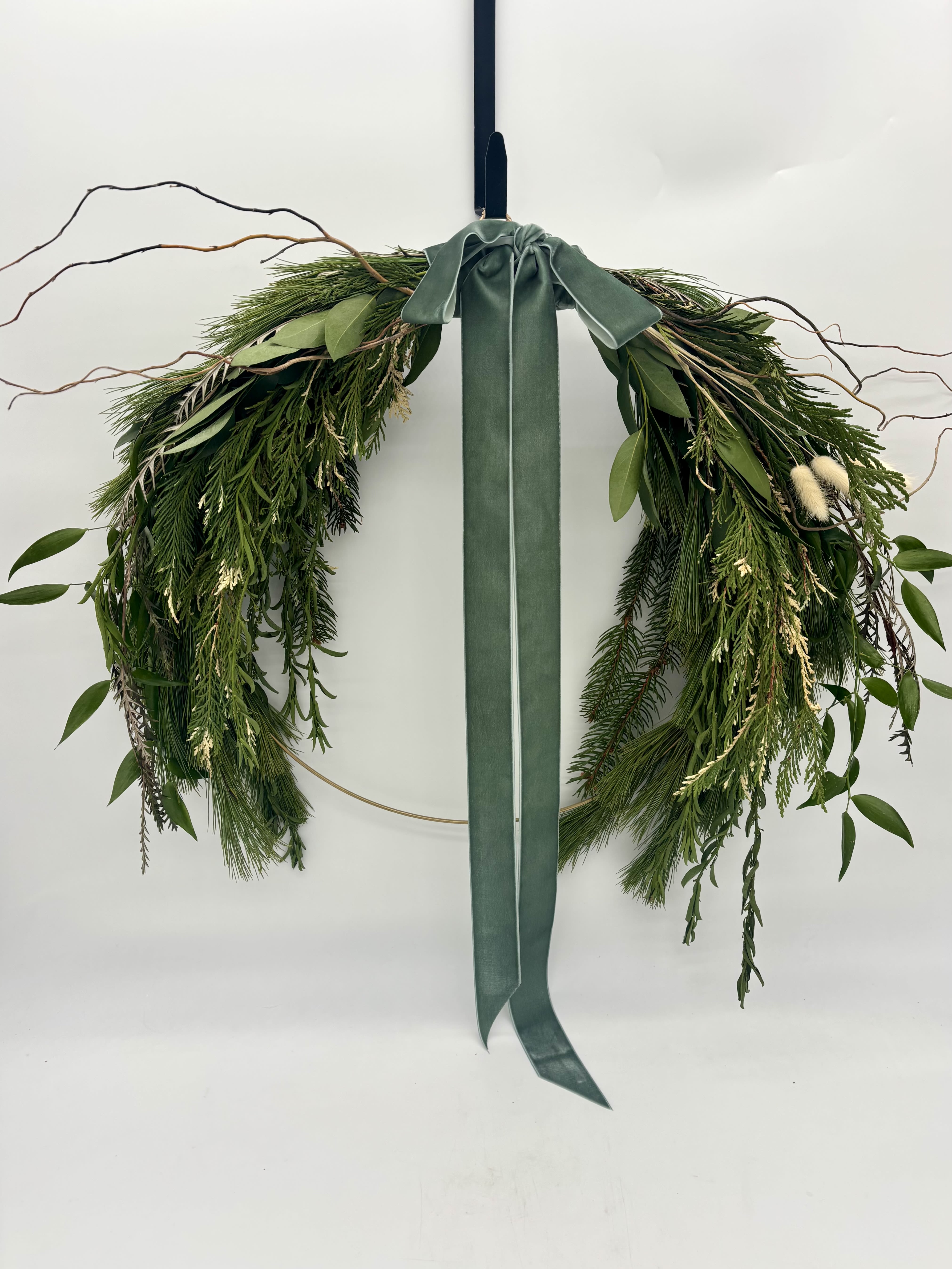 Boho Evergreen Wreath - One of a kind! Natural 18 inch gold hoop wreath arrangement with mixed evergreens. Complimented with a dusty sage velvet ribbon. 