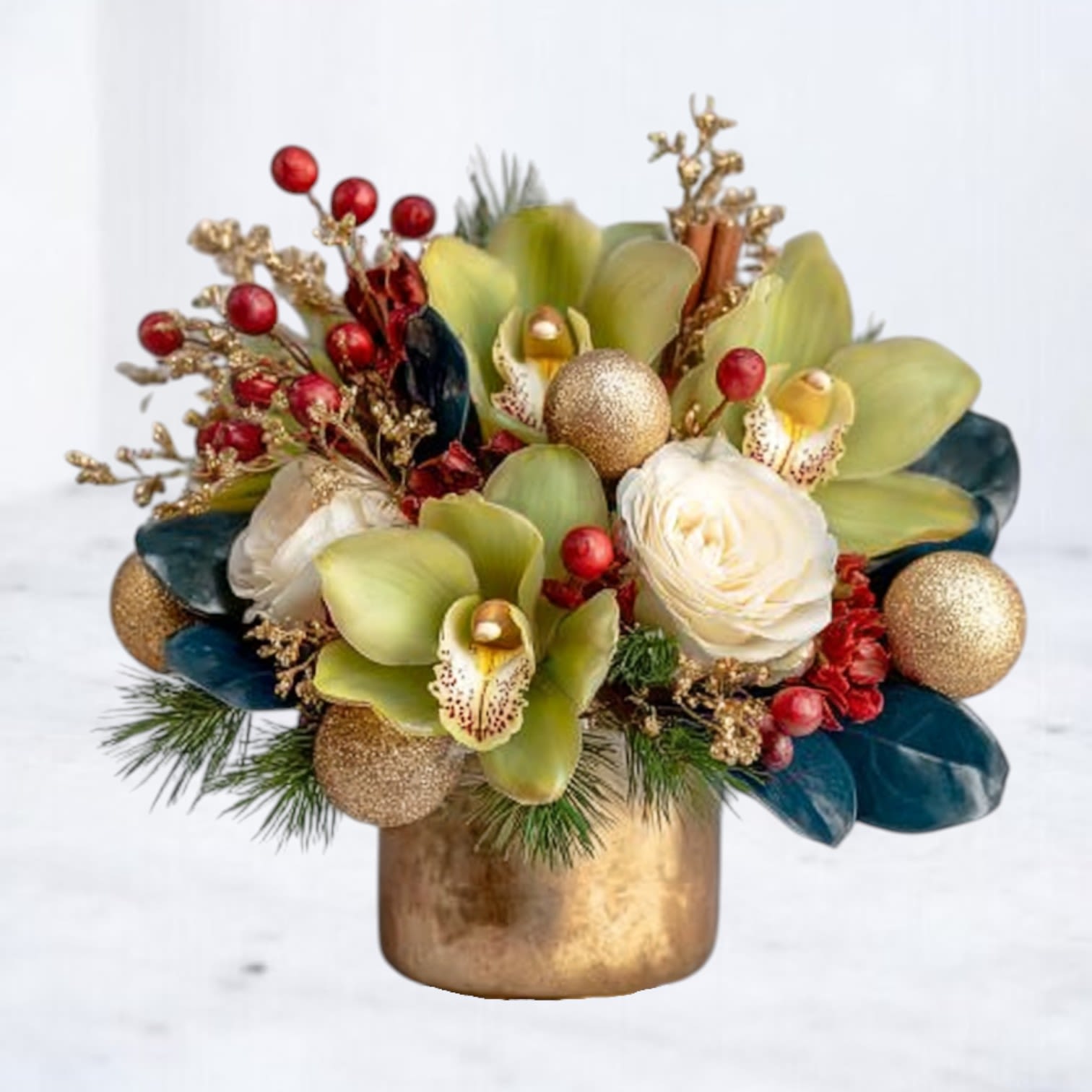 Auric Noel - The Auric Noel embodies the refined glow of the season, blending green cymbidium orchids and creamy roses with festive red berries, evergreens, and gilded accents in a golden vessel. Designed by Whiskey Wallflower, it merges modern elegance with the warmth of holiday tradition — a sophisticated accent for tables, entryways, or seasonal gifting.  Now available for same-day holiday flower delivery in Galveston, Jamaica Beach, Tiki Island, Sea Isle, Hitchcock, La Marque, Santa Fe, Texas City, League City, Dickinson, Kemah, Clear Lake, Webster, and surrounding coastal communities along Galveston Bay.  Substitution Disclaimer Due to seasonal availability, some blooms or accents may be replaced with similar premium varieties of equal or greater value to maintain the design’s look and integrity. Your arrangement will always reflect the same spirit, palette, and premium quality.