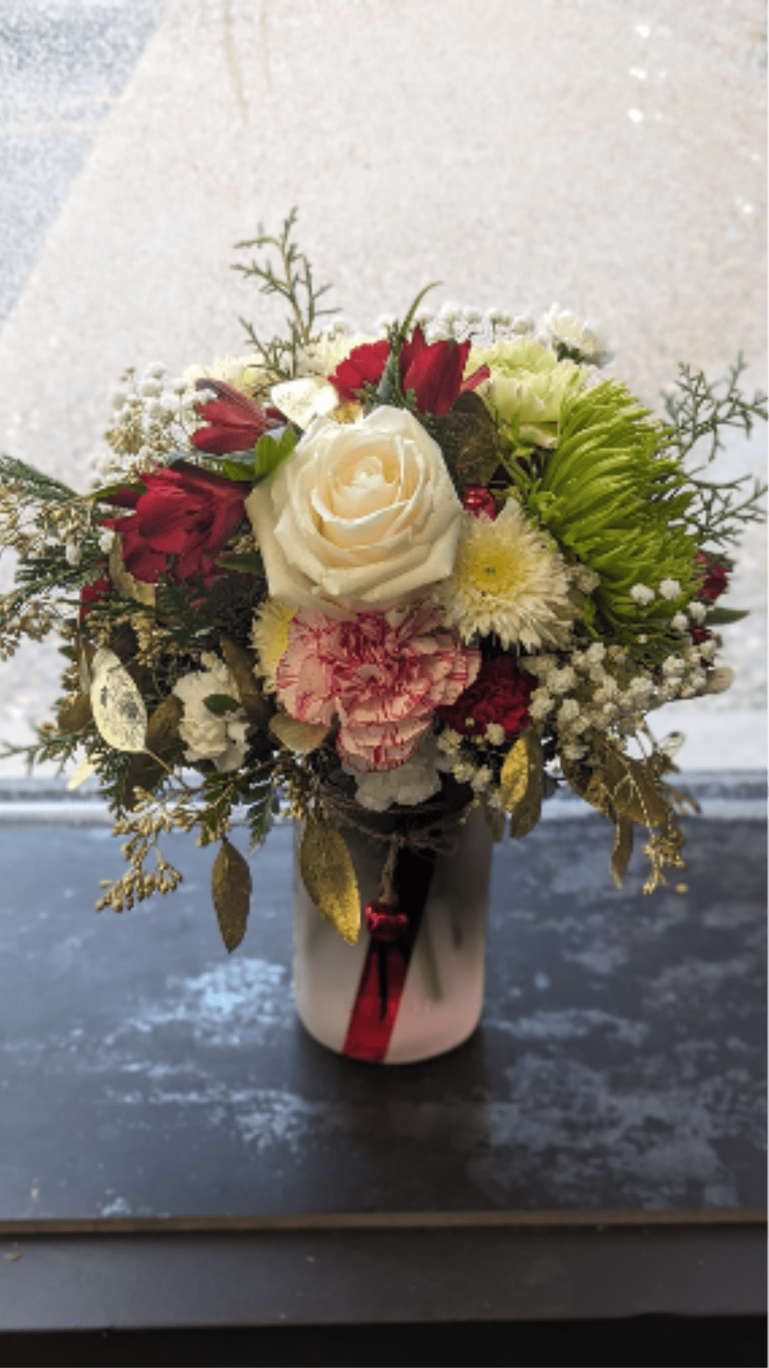 Small Vase Arrangement  - Small holiday vase arrangement filled with longer lasting festive florals and trim, perfect for the Christmas season.