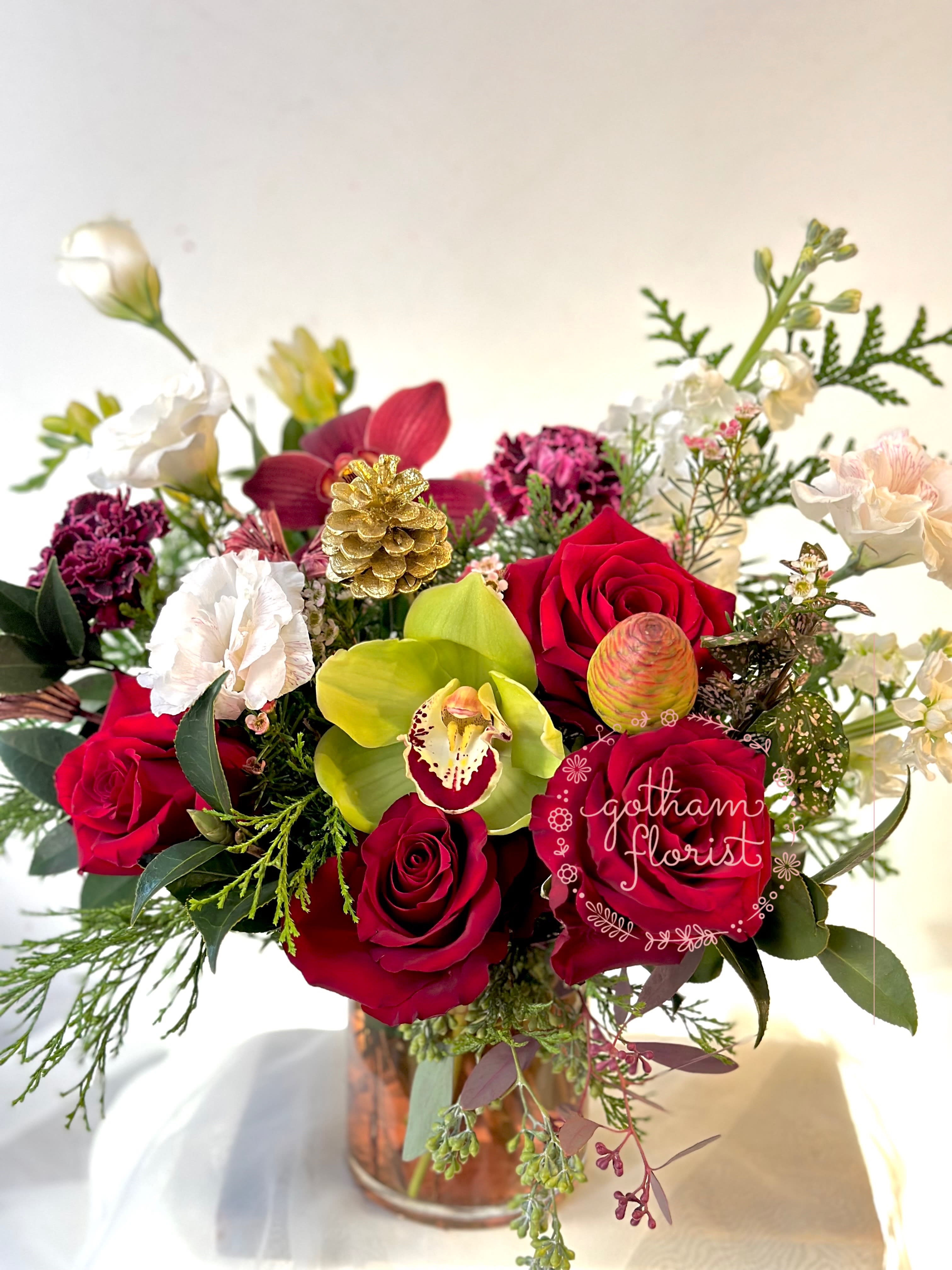 Jolly - Red, white and green blooms to send holiday cheer. A perfect gift for Christmas!  Send the best flowers from the best flower shop in New York. We offer same day flower delivery in Manhattan, Queens, Bronx, Brooklyn, Staten Island and West Chester counties. We have the prettiest and most luxurious flowers to choose from and our designs are unique and whimsical. We carry Peonies almost every day of the year!! 