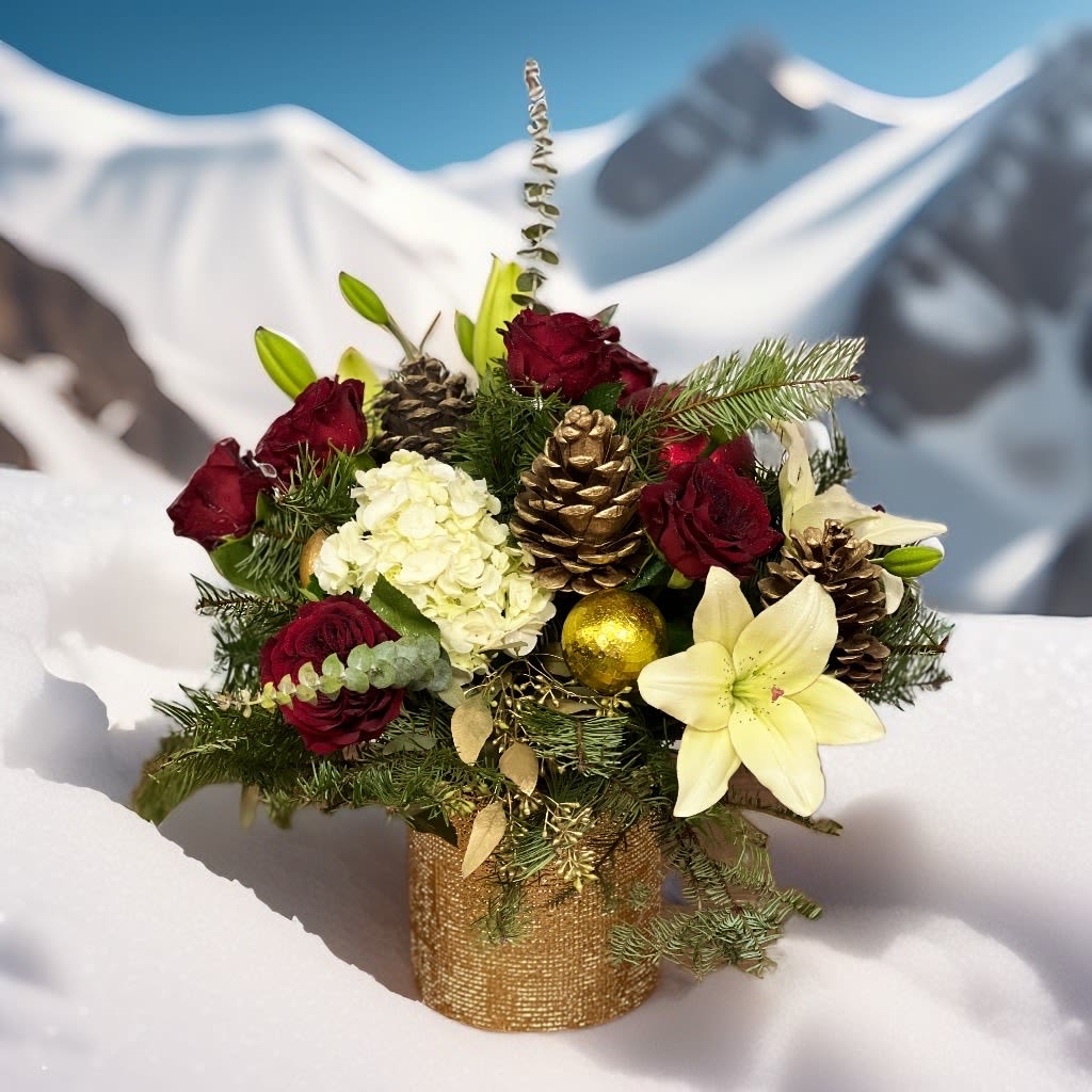 Christmas Happiness - in a gold vase Christmas green, red roses, white lilies, white hydrangeas, pinecones, ornaments 