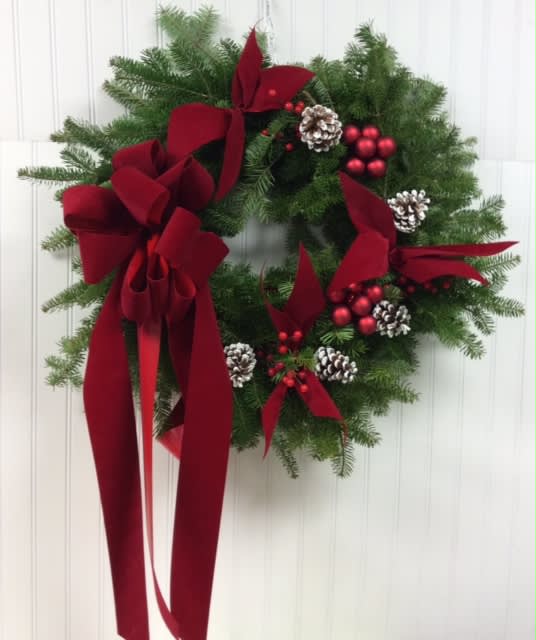 Holiday Fresh Balsam Wreath - A Fresh decorated Balsam wreath with ribbons, pines cones and berries, perfect for your front door!