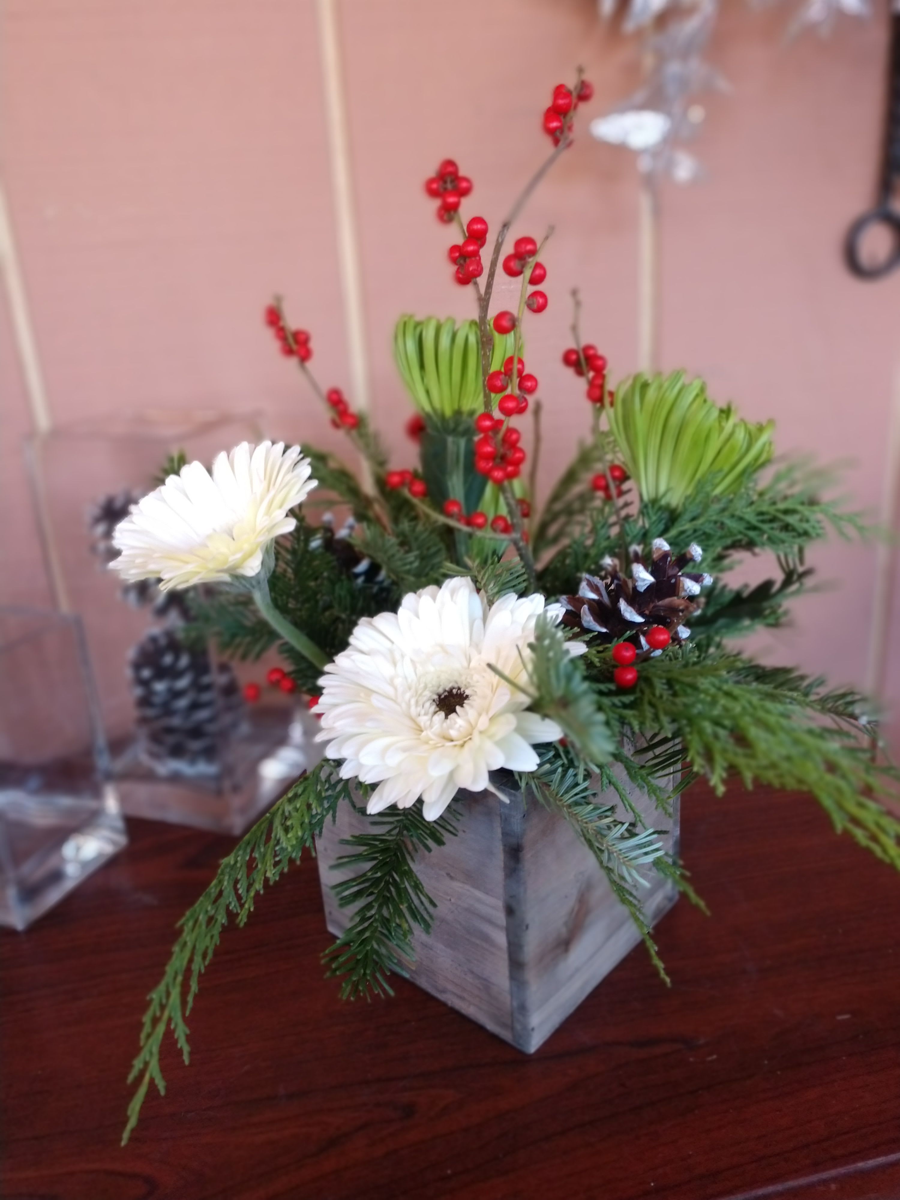 Winer Elegance - Simple and sophisticated this woodland planter with seasonal blooms.