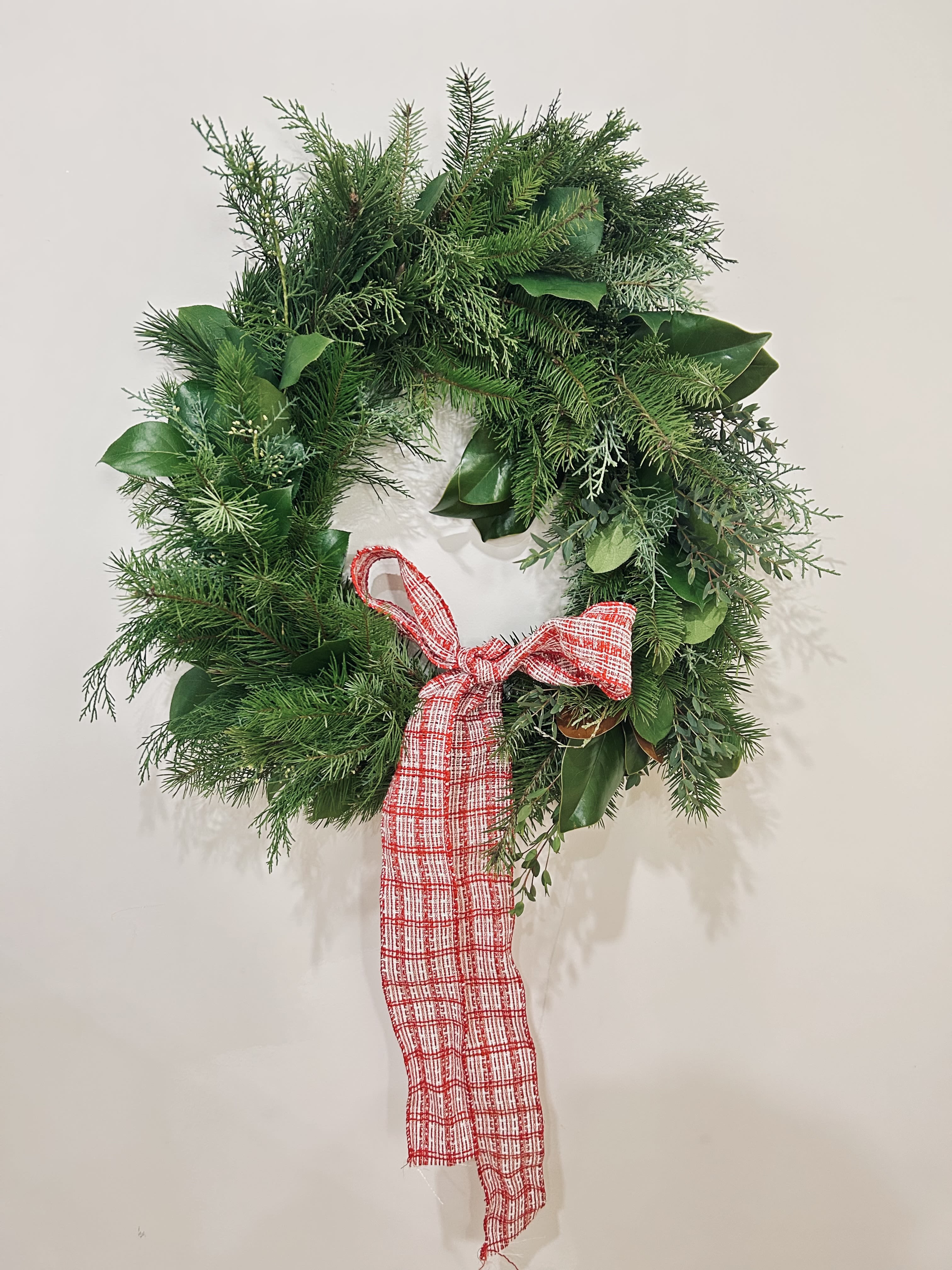 Joy To The World Wreath  - Wreath is available in one size. Decorated with Christmas greenery, ribbons, &amp; Christmas ornaments! Perfect for this season and for your door!