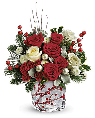 Winterberry Kisses Bouquet... SALE PRICE - Red roses, red spray roses, and white button spray chrysanthemums are arranged with dusty miller, variegated holly, noble fir, white pine, and birch. Delivered in Teleflora's Winterberry Kisses cube. Orientation: One-Sided