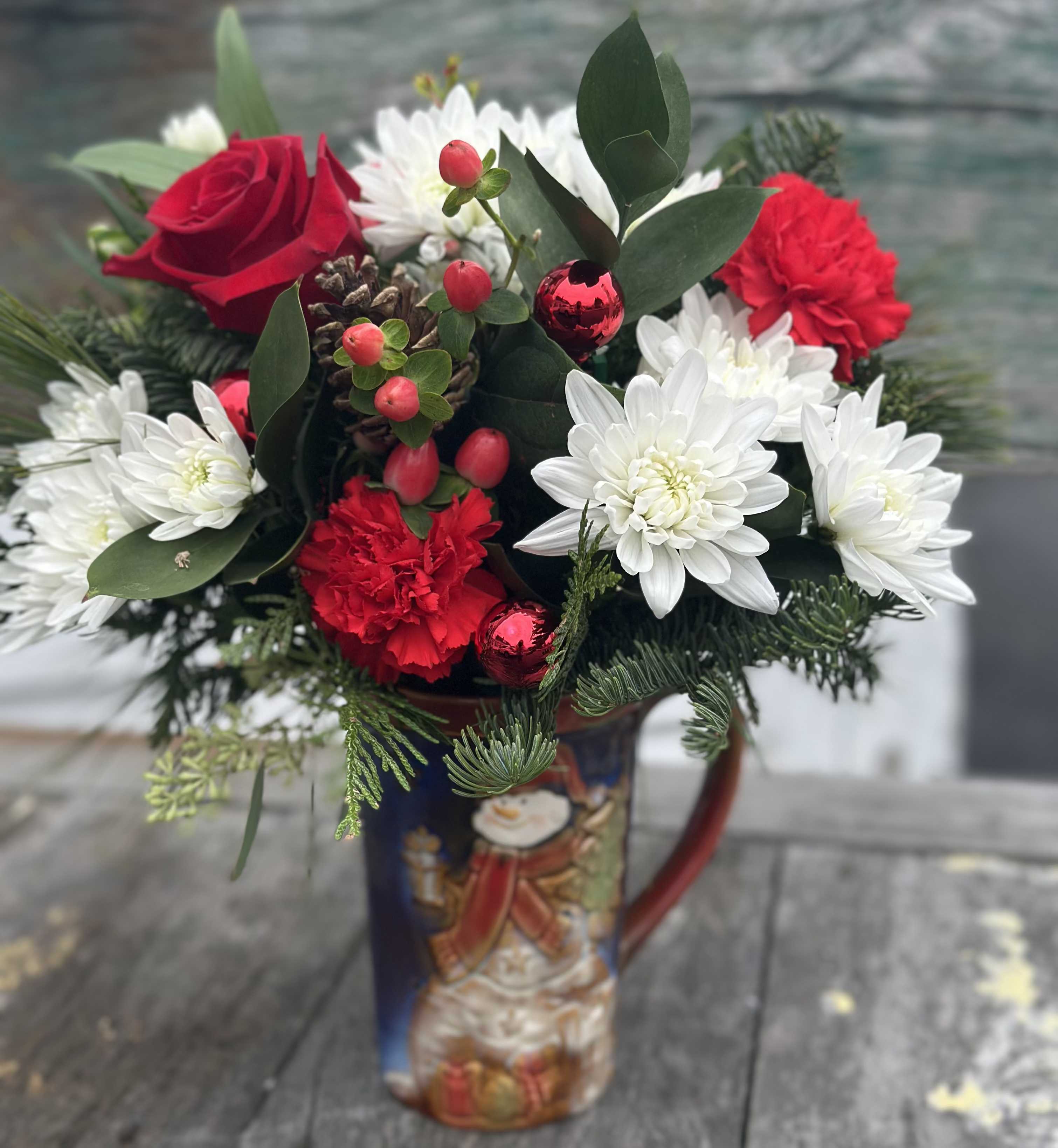 Frosty's Floral Mug - Glazed ceramic mug filled with red roses, carnations, hypericum berries and white chrysanthemums balsam, pine and seeded eucalyptus