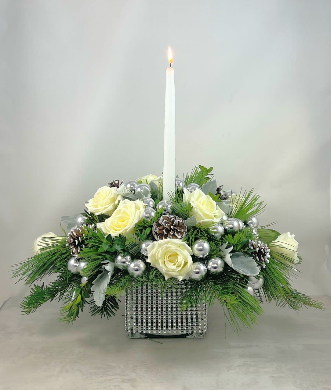 Holiday Bright Bouquet - White, bright and lights are everything you need to add pizzazz to your holiday table.  Spirits will be high as you gather with friends and loved ones with with the Holiday Bright bouquet setting the mood.
