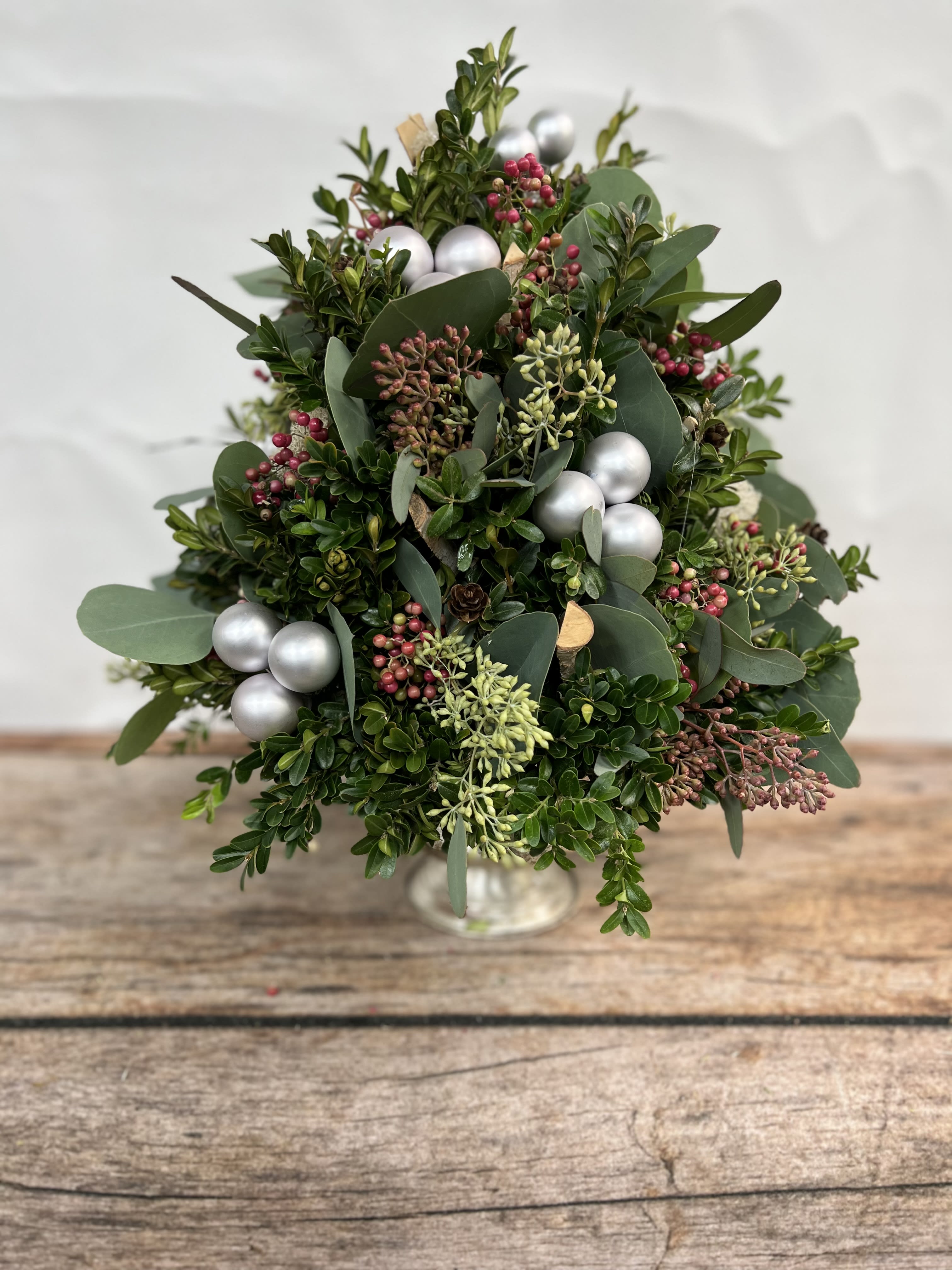 Boxwood Tree - Each stem of boxwood is perfectly placed by our designers replicating a mini tree.  Each tree uniquely decorated in a beautiful container. A stunning gift. *Note - each tree is uniquely decorated and the photos represent samples of our work.