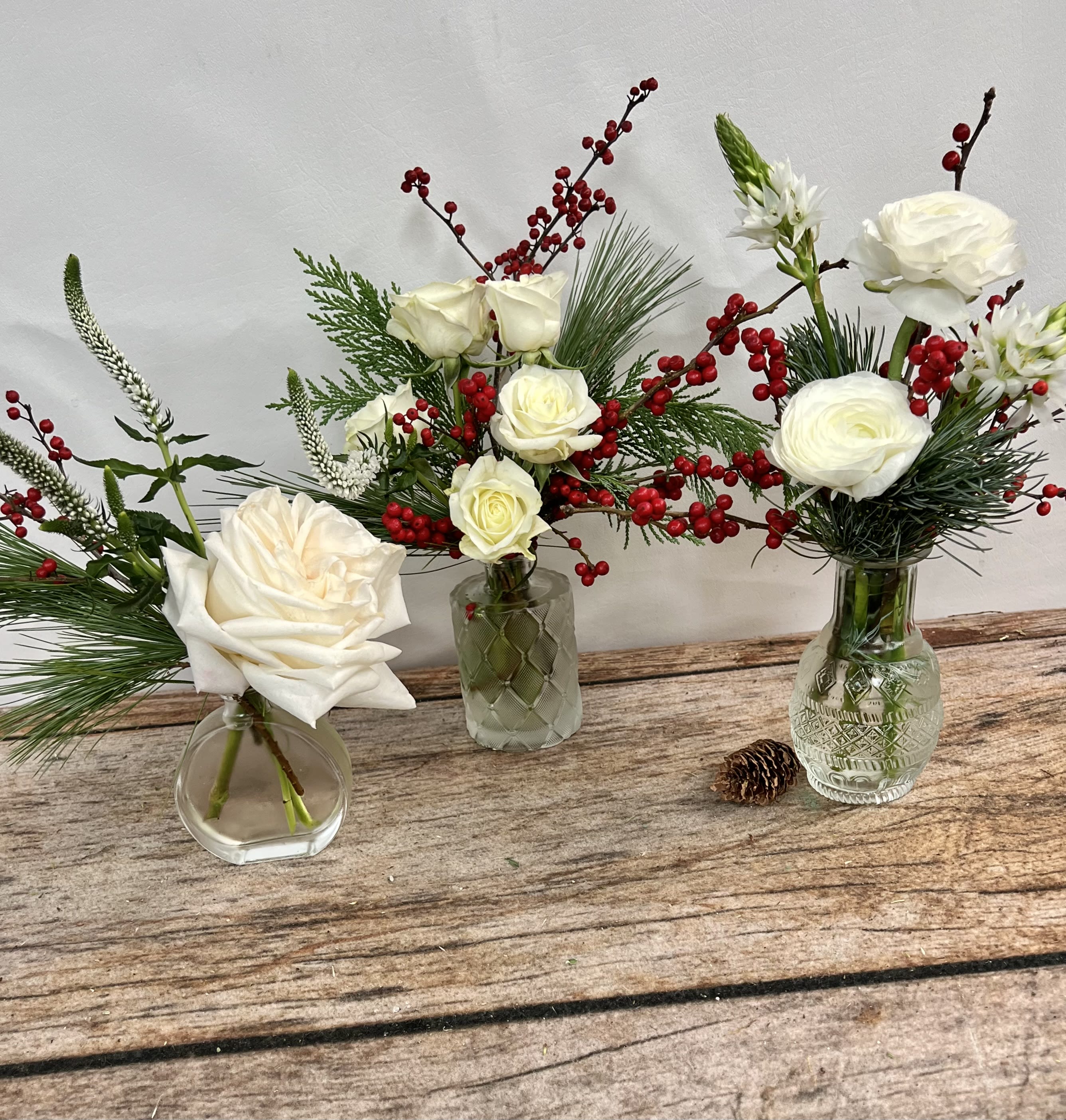 Winter Trio - A unique collection of bud vases. For someone that loves variety, or to go down a rectangular table. Order the deluxe or premium for an extra special effect.  Perfect for cocktail tables, too! Approx. 8&quot;x4&quot;. Sizes will vary