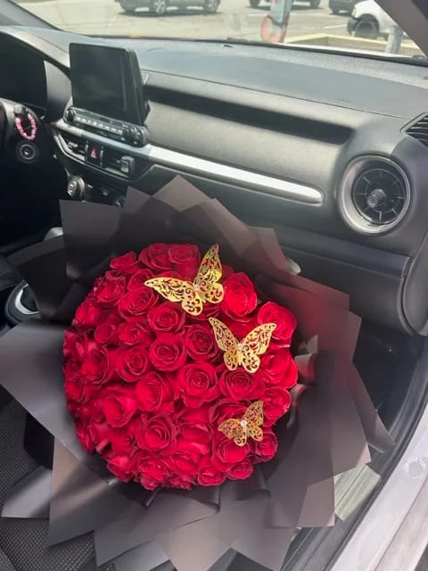 Classy Butterfly Rose Bouquet - Our Classy 50 Ecuadorian Rose Bouquet with the Butterfly details this is the Standard Selection. Very unique and elegant gift for sure!