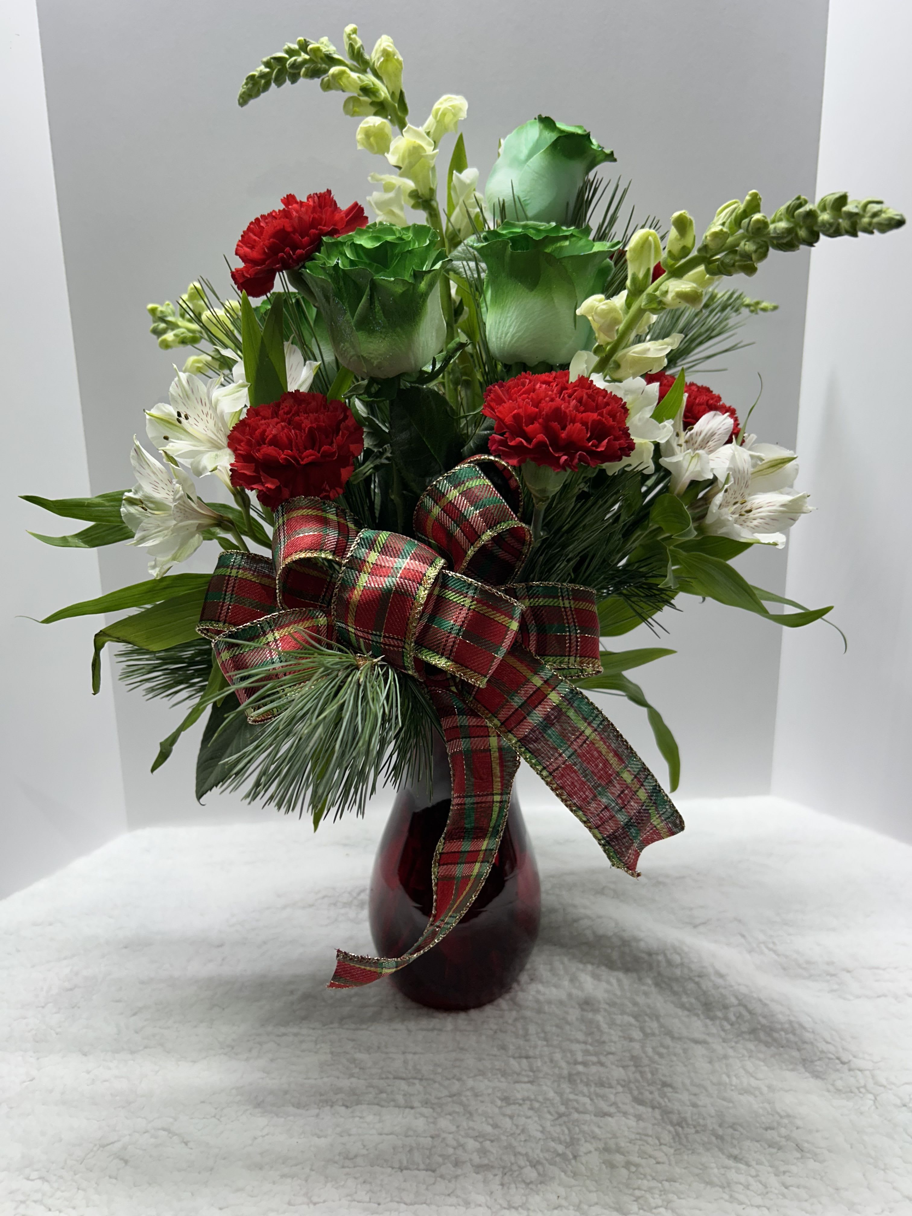 You’re A Mean One - Red vase filled with mixed pine, fresh flowers and plaid bow