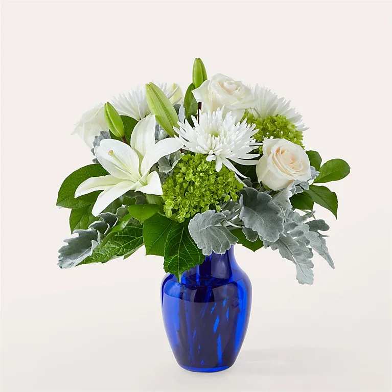 Snowy Dreams Bouquet - Our Snowy Dreams Bouquet is a stunning and elegant floral arrangement that captures the serene beauty of a winter wonderland.