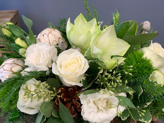 Winter Wonderland - Box design in shades of white and green: amaryllis, roses, lisianthus, pine cones and textured greens