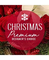 Christmas Premium Designer's Choice - Looking for something extra special for the holidays? Send our Premium Designer’s Choice flower arrangement to someone who deserves the world this Christmas! Our designers will create a grand bouquet of seasonal flowers that will make any room feel radiant and bright for the holiday festivities. 
