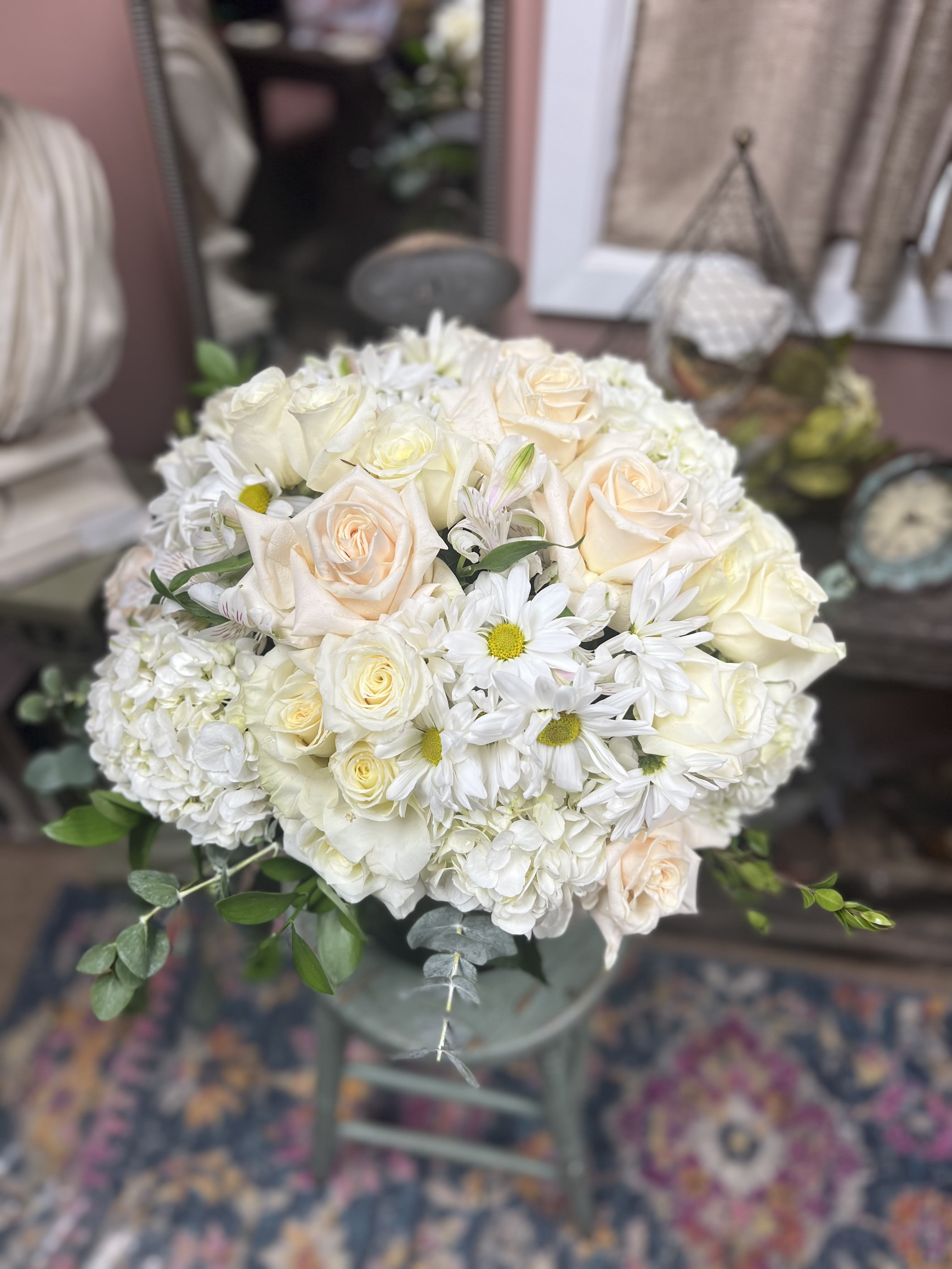 Angelic Reminder - Designers Choice of array of fresh cut White Tones Florals with mix greens for trim placed in Vase with Bow