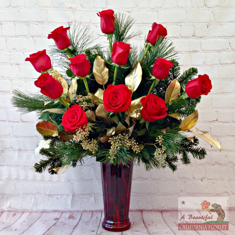 Christmas of Love Roses - The season of Love in roses, one dozen (pictured). Also available in eighteen roses or go premium two dozen holiday themed ROSES! Merry Christmas Sweetheart!  Standard - one dozen (12) Christmas of Love Roses (PICTURED) Deluxe - eighteen (18) Christmas of Love Roses Premium - two dozen (24) Christmas of Love Roses - Gorgeous!