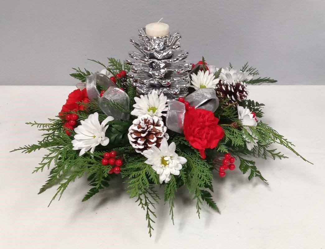 The Silver Pine Cone Centerpiece - This shinny silver pine cone candle holder centerpiece will be a delight for all the holiday seasons now and to come and makes the perfect gift this season and many more as well.