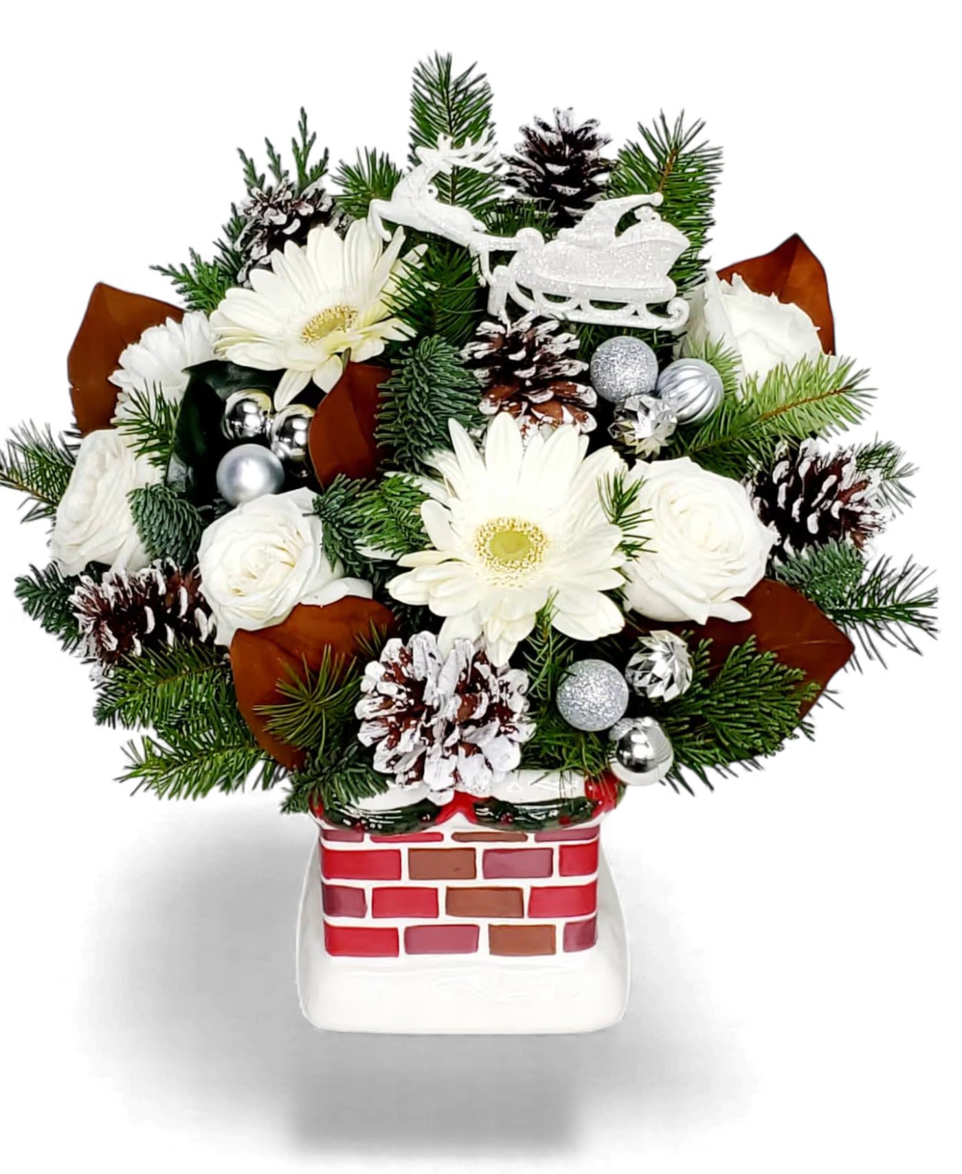  Chimney Top Arrangement - Capture the magic of Christmas with our uniquely designed &quot;Chimney Top&quot; floral arrangement. This premium holiday bouquet features stunning white roses, crisp white gerber daisies, and classic white carnations, all nestled on a rich bed of fragrant Christmas greens and elegant magnolia leaves.  The design is expertly finished with shimmering silver ornaments, frosted pinecones, and a charming sleigh and reindeer accent, creating a perfect winter white theme.  The flowers are lovingly arranged in a beautiful, durable ceramic Chimney Keepsake vase that customers can cherish long after the holiday season has passed, making it an excellent value and a memorable holiday gift.  Dimensions: Approximately 17&quot; H x 12&quot; W  Keepsake Value: Long-lasting ceramic chimney vase included.  Keywords: Custom arrangement, holiday decor, Christmas centerpiece, white flowers, keepsake gift.   Local Long Beach Florist &amp; Services Order your one-of-a-kind holiday custom arrangement from ABC Florist Long Beach, your trusted local and woman-owned flower shop in Long Beach, California.  We pride ourselves on creating the most beautiful and unique florals for the holidays and every day. We offer same-day flower delivery across the Long Beach area and convenient pickup at our shop. Support local business this season!
