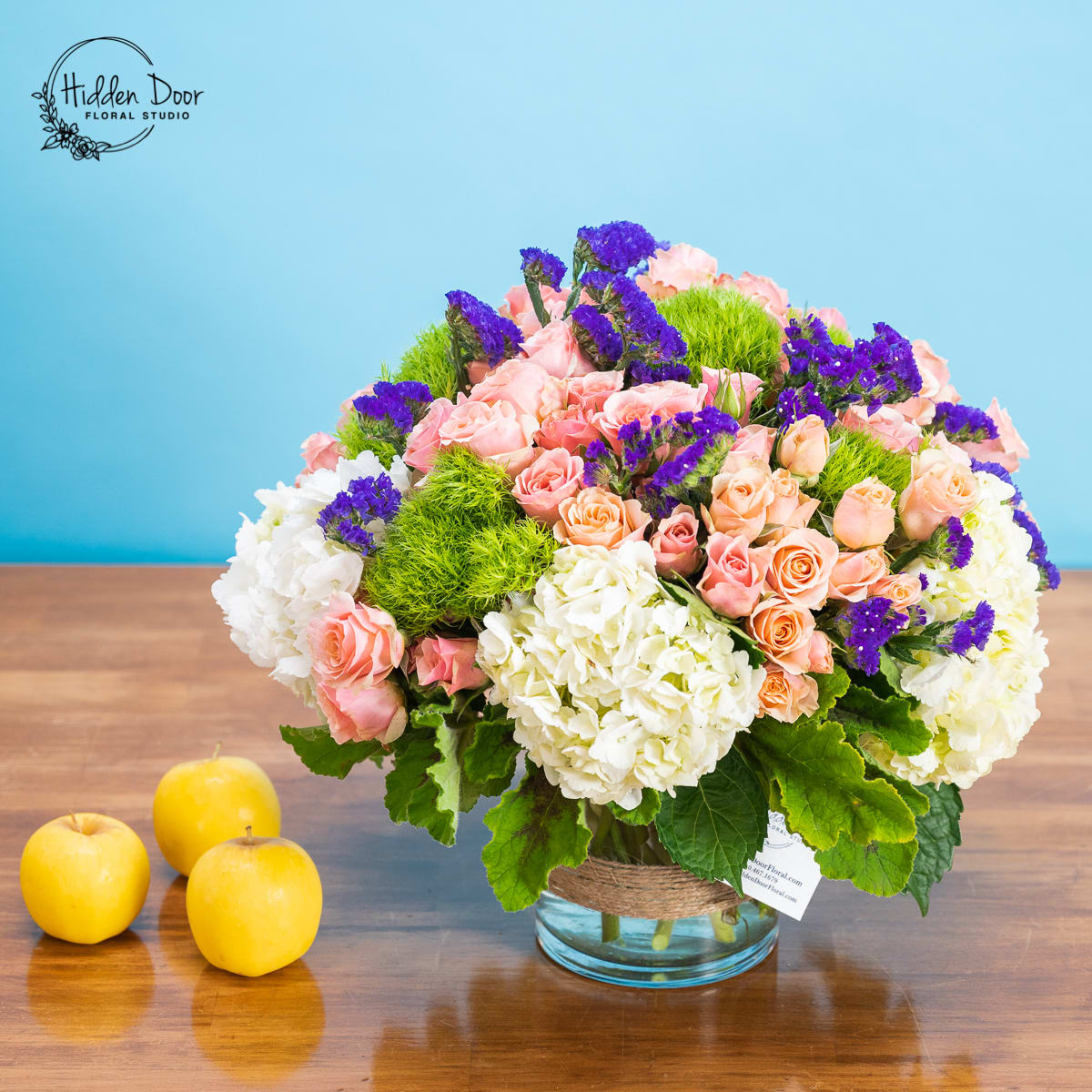 Monet - Monet Soft, artful, and beautifully balanced, Monet is a modern interpretation of impressionist romance. Lush rounded blooms, delicate pastels, and vibrant pops of color come together in a full, painterly composition reminiscent of a sunlit garden scene. Designed in a low glass vessel that highlights its gentle silhouette, this arrangement feels fresh, uplifting, and effortlessly elegant — perfect for birthdays, celebrations, or anyone who appreciates florals with both charm and artistic depth. Please Note: Our arrangements are handcrafted, and no two pieces are ever identical. Variations in flower types, color tones, and exact placement will occur based on daily availability. We do not create factory-duplicate designs — instead, we recreate the style, palette, and overall feel of the arrangement while ensuring every piece is fresh, beautiful, and premium.   