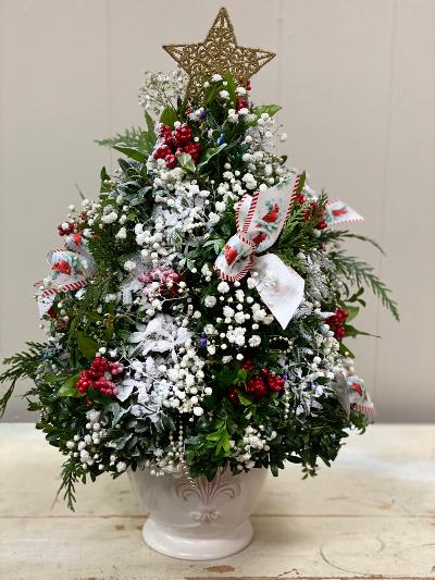 Deck the Halls Tree - Each unique English boxwood arrangement mimics a real tree and its one of a kind decorations and base make it a super special holiday present!  Ornaments, flowers, ribbons and balls...the choices are tremendous as are their reactions when the receive this special gift!
