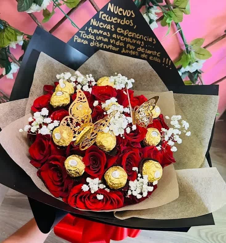 Red Rose Bouquet With Chocolates - 2 Dozen red roses (wrapped in paper) with 9 Ferrero Rocher chocolates. baby breath and butterflies