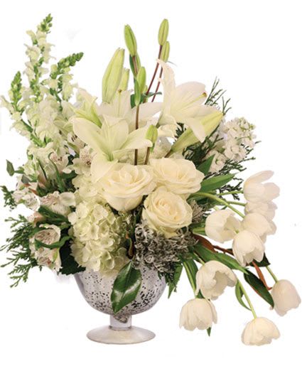 BESPOKE IVORY FLOWER ARRANGEMENT - The holidays don't get much more elegant than this! A gorgeous design of ivory and white, this arrangement is blooming with roses, lilies, tulips, hydrangea, and more. Our Bespoke Ivory arrangement is the perfect way to decorate your table for a season full of beauty! 