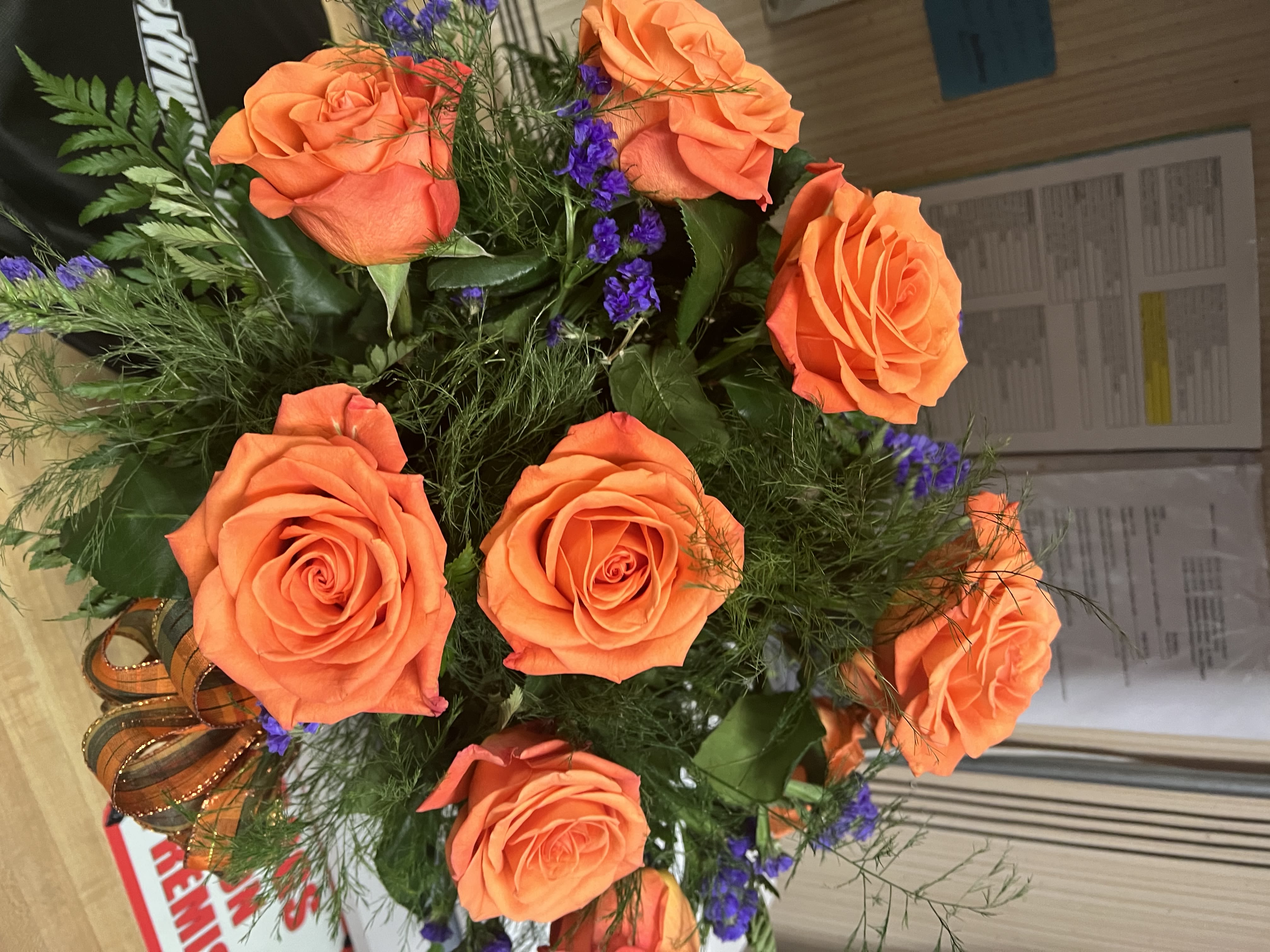 Orange Roses Vased - 12 orange roses, baby's breath or filler with greens , vase and bow  $85.00 24 orange roses, baby's breath or filler with greens , vase and bow  $160.00 50 orange roses, baby's breath or filler with greens , vase and bow  $310.00