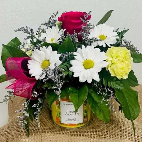 Flowers and Scents - Send your special someone a beautiful mix of seasonal flowers placed above a scented candle!  Candle scent and flowers will vary.