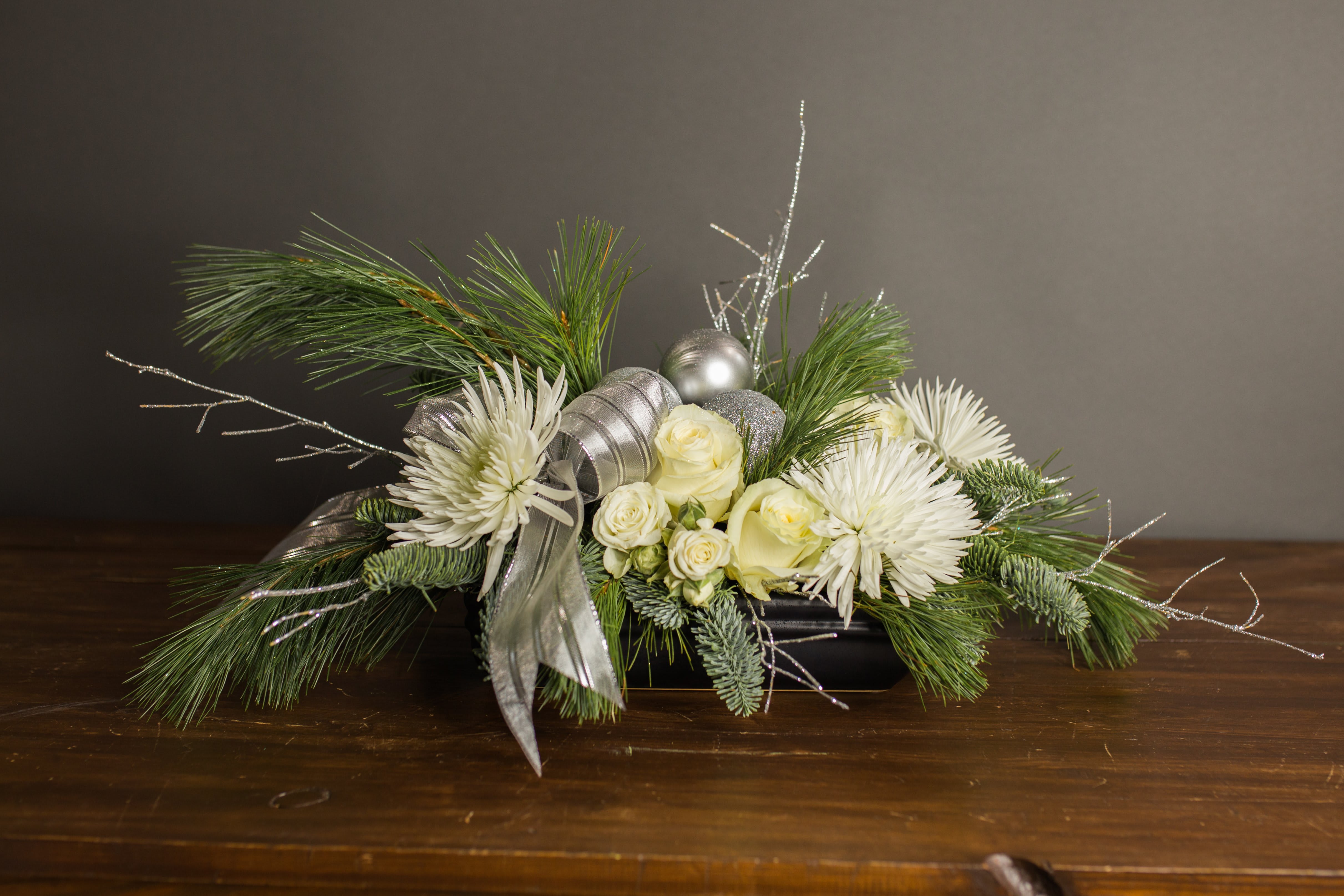 White Christmas - We're dreaming of a White Christmas! This arrangement is perfect for those who love a neutral holiday color pallet.