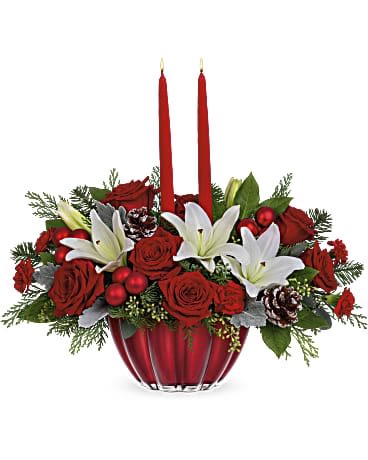 Teleflora's Joyous Christmas Centerpiece - Spread joy with this festive holiday centerpiece featuring a stunning scalloped glass keepsake bowl filled with classic red roses and snowy lilies. Order this Joyous Christmas Centerpiece and deliver joy right to your loved one's door. This Christmas arrangement includes red roses, white asiatic lilies, miniature red carnations, dusty miller, noble fir, seeded eucalyptus, lemon leaf and cedar. Delivered in Teleflora's Vibrant Christmas Bowl. Orientation: All-Around