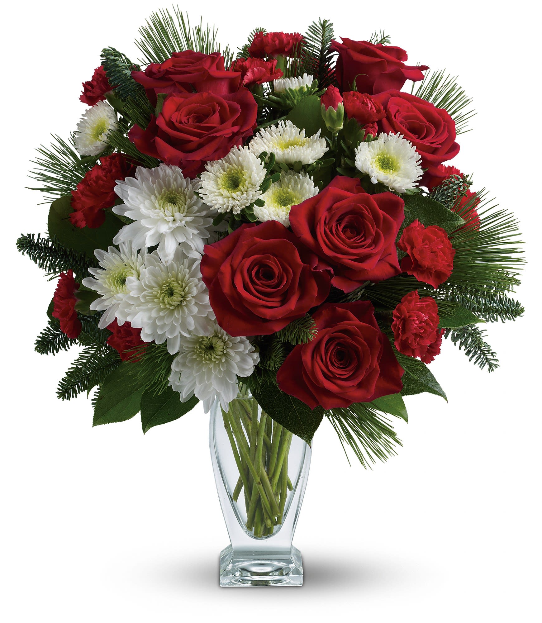 Teleflora's Winter Kisses Bouquet - This heartwarming bouquet includes red roses, red carnations, red miniature carnations, white matsumoto asters, white cushion chrysanthemums, noble fir, white pine and lemon leaf. Delivered in a gorgeous glass Couture vase. Approximately 14 3/4" W x 16 1/4" H.  TWR12-1A