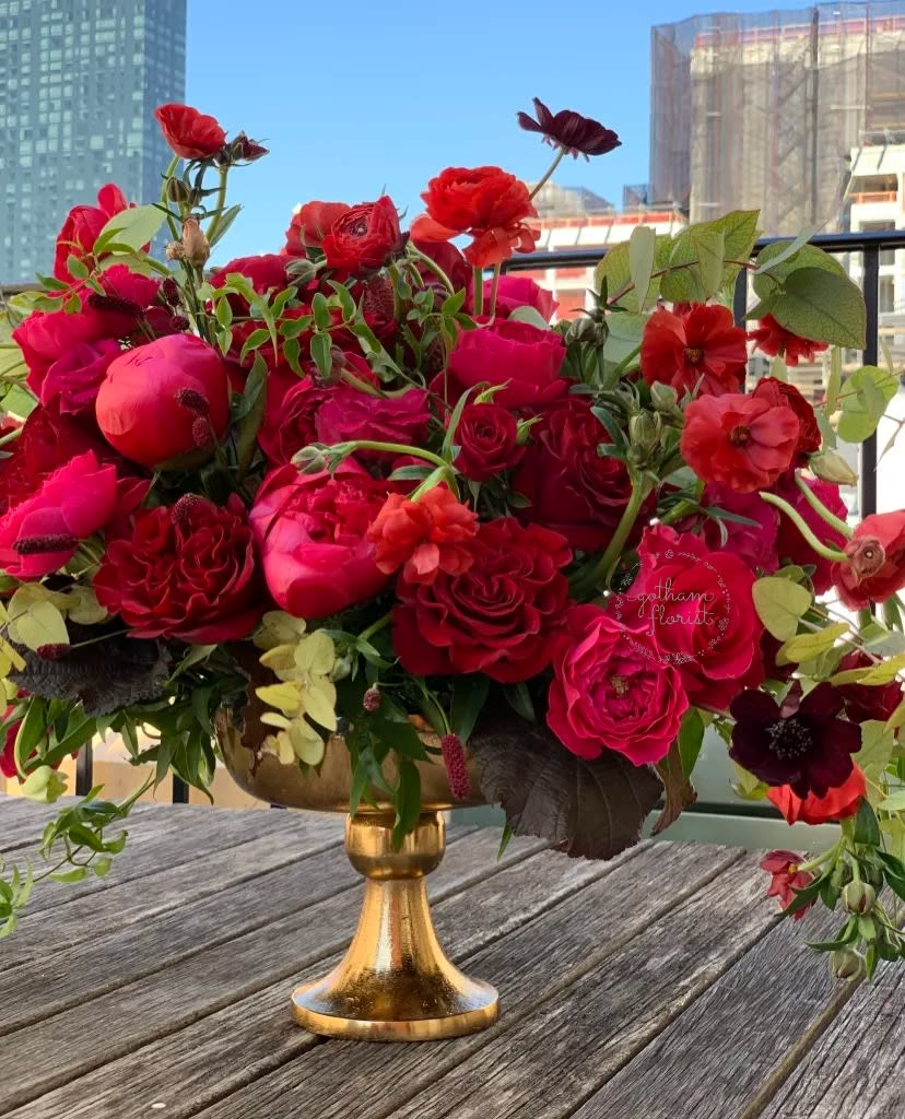 Hearts on Fire - (PLEASE CALL OR EMAIL IF DESIGN IS SOLD OUT ONLINE) Lush romantic flowers in reds and dark pink. Stunning design to wow. Send the best flowers from the best florist in new york.