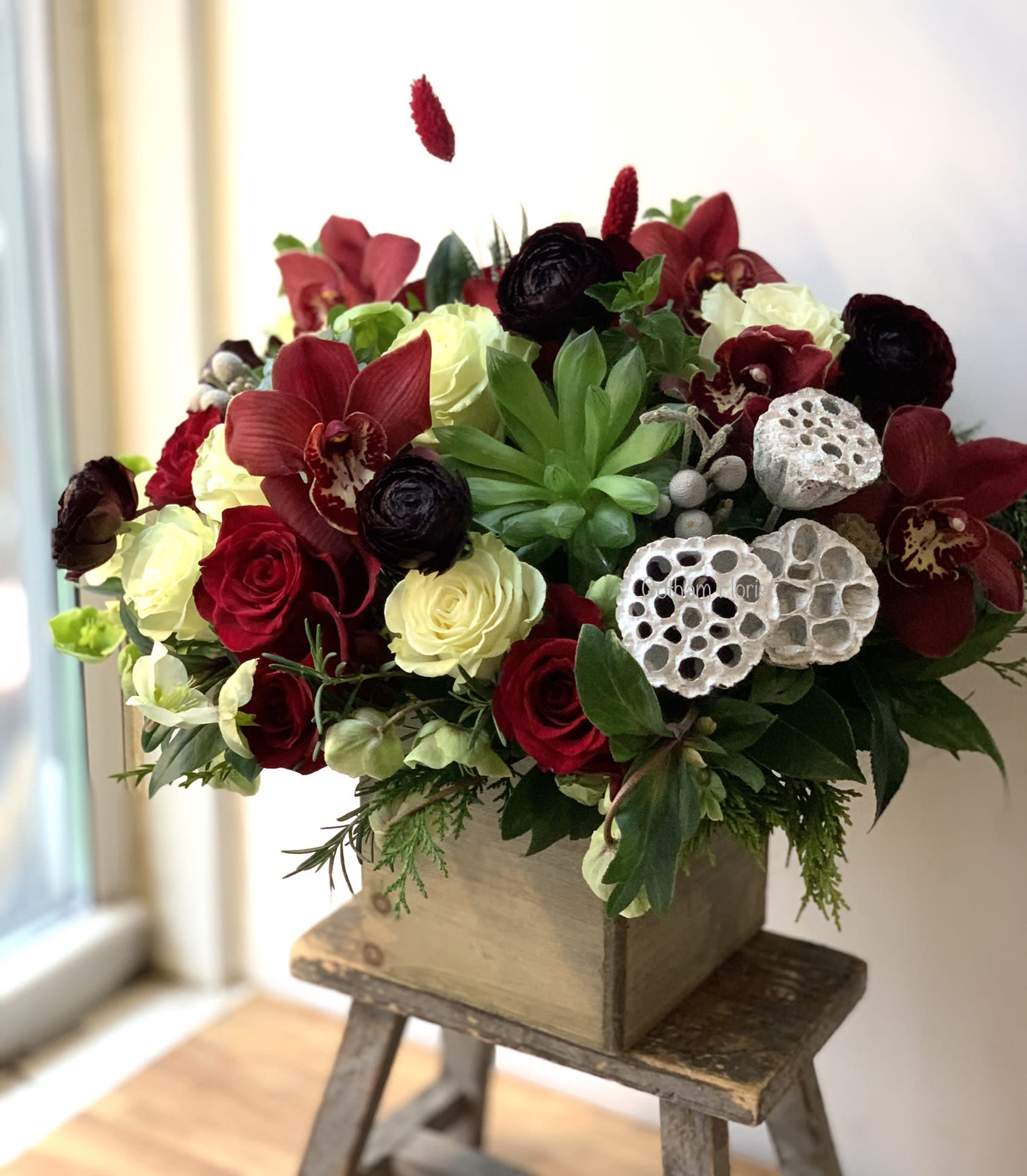 Holiday Garden - Our grey gardens design dressed up for the holidays! Send the best flowers from the best flower shop in New York. We offer same day flower delivery in Manhattan, Queens, Bronx, Brooklyn, Staten Island and West Chester counties. We have the prettiest and most luxurious flowers to choose from and our designs are unique and whimsical. We carry Peonies almost every day of the year!!Send the best flowers from the best florist in new york city.