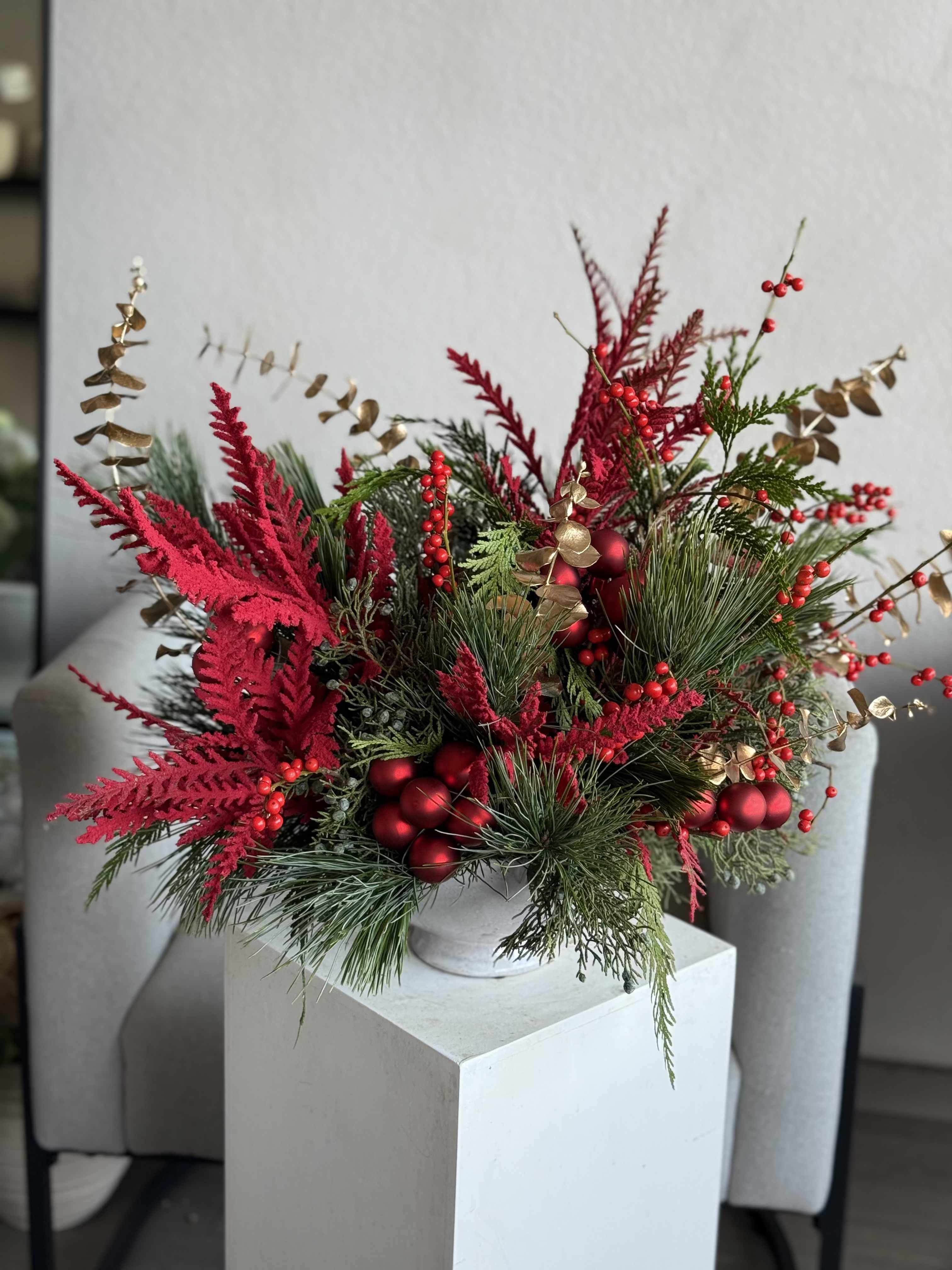 Long Lasting Christmas arrangement - A long-lasting Christmas arrangement crafted with premium seasonal greens and festive accents. Designed to stay beautiful throughout the holiday season.