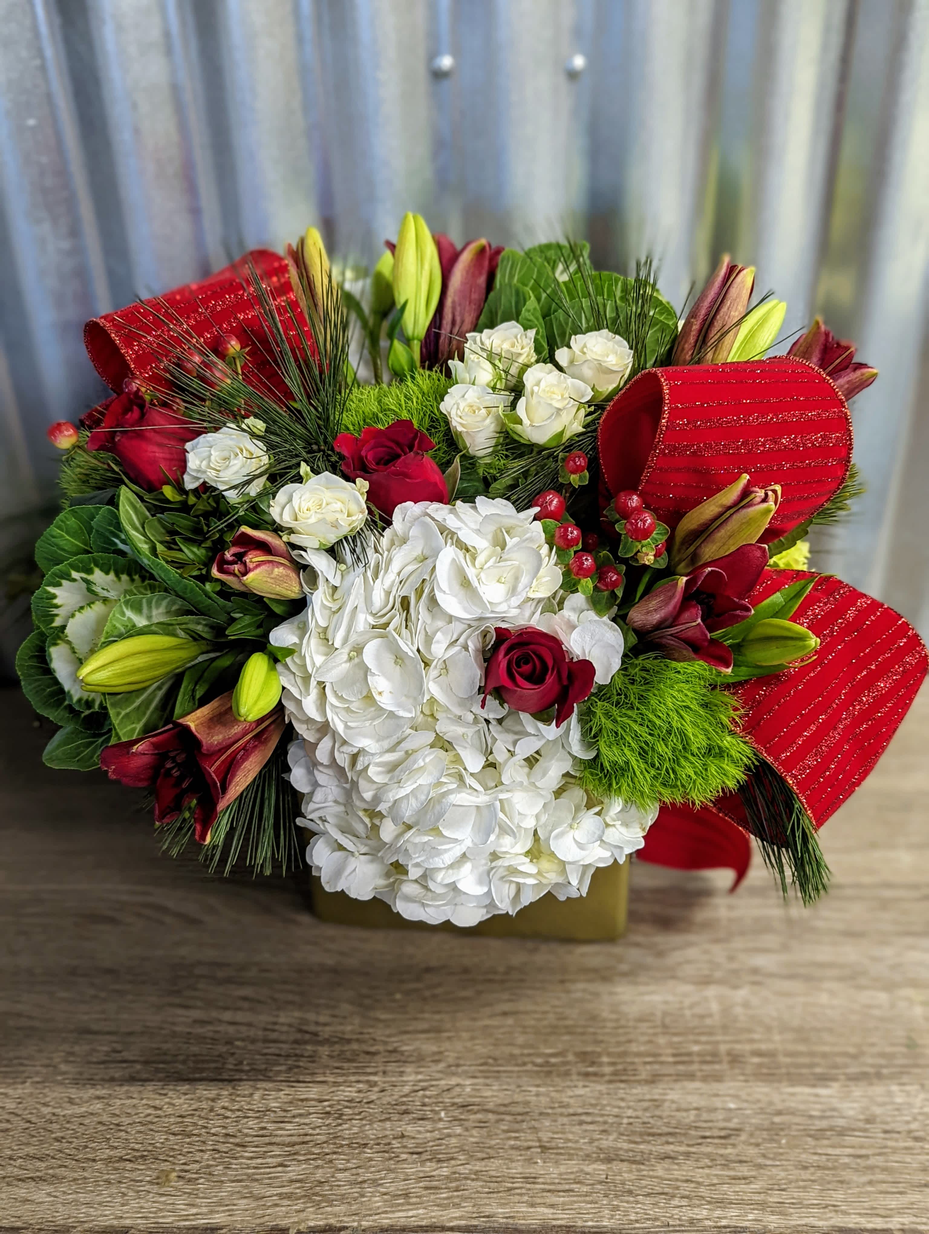 Baldr - A bright and cheery Christmas present with reds, whites, and greens.