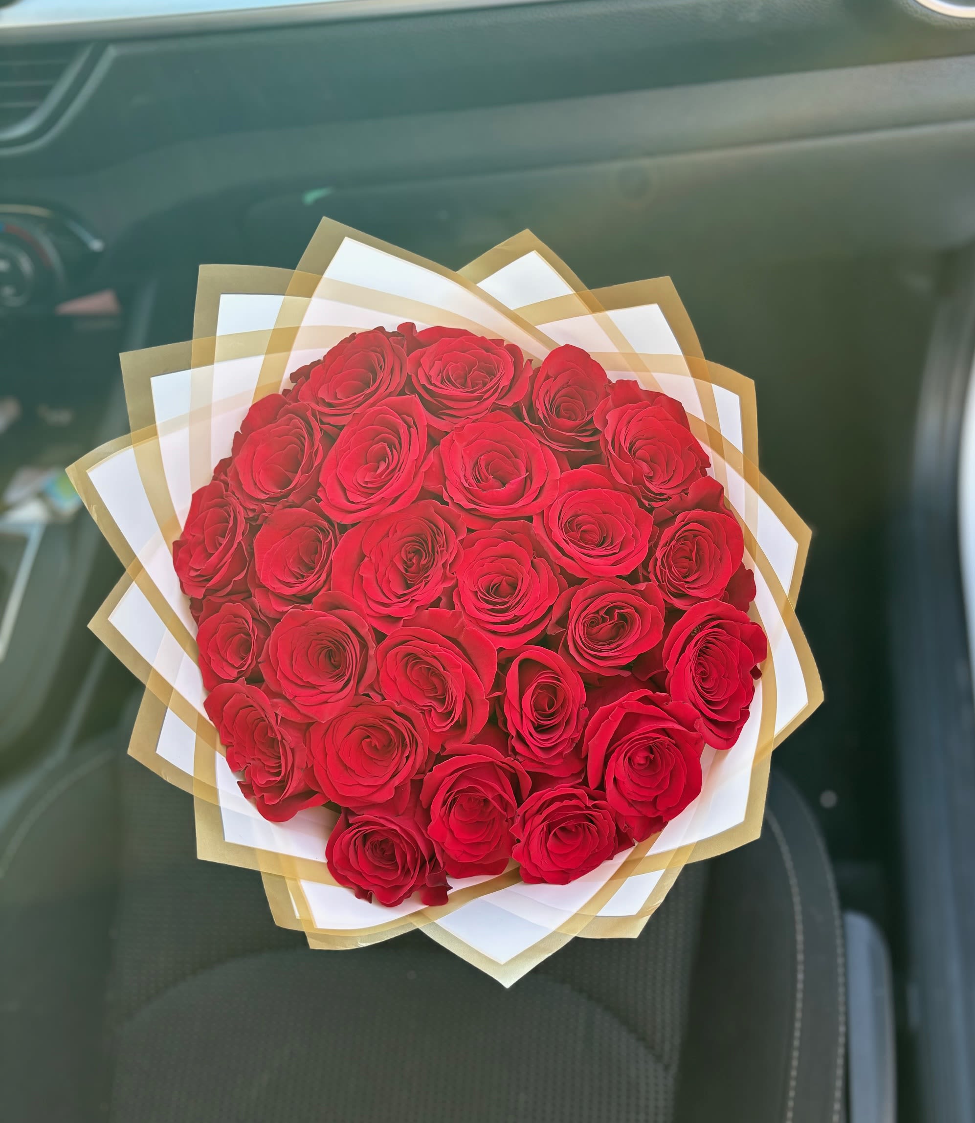 Blushing Bouquet - Sweet bouquet of Red 25 Ecuadorian Roses, with a light pink wrap. 