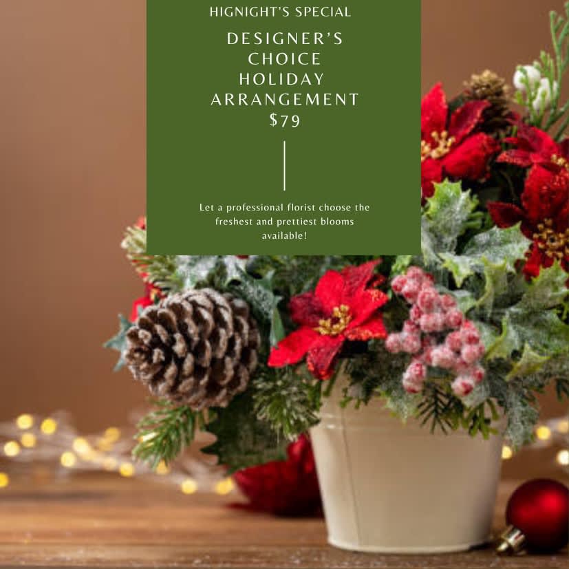 $79 Designer's Choice Arrangement - Winter Designer’s Choice – Premium  Experience a premium seasonal arrangement designed by the expert florists at Hignight Florist in East Moline, IL. This Designer’s Choice bouquet is crafted with the freshest flowers and greenery available, ensuring a one-of-a-kind floral gift or centerpiece for the holidays.  Local delivery is available throughout East Moline (61244), Moline (61265), Silvis (61282), and the surrounding Quad Cities area. 