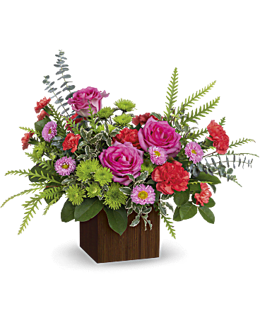 Catch the sun - Elevate their mood with the vibrant beauty of hot pink roses and lush green mums! This stunning arrangement, elegantly presented in a chic bamboo cube, adds a modern touch that's sure to impress.  At our flower shop in Ajax, we pride ourselves on delivering premium floral designs that bring joy and warmth to any occasion. Enjoy the convenience of same-day delivery to Ajax, Whitby, Pickering, and Oshawa. Experience the difference with us – order today and let your loved ones bask in the beauty of these exquisite blooms!