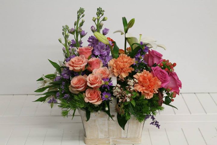 Happy Bouquet/26 - In this arrangement, variety of flowers including Rose. Spray Rose, Stock, Asiatic Lily, Alstroemeria, Carnation and variety of fillers are arranged in a basket. 