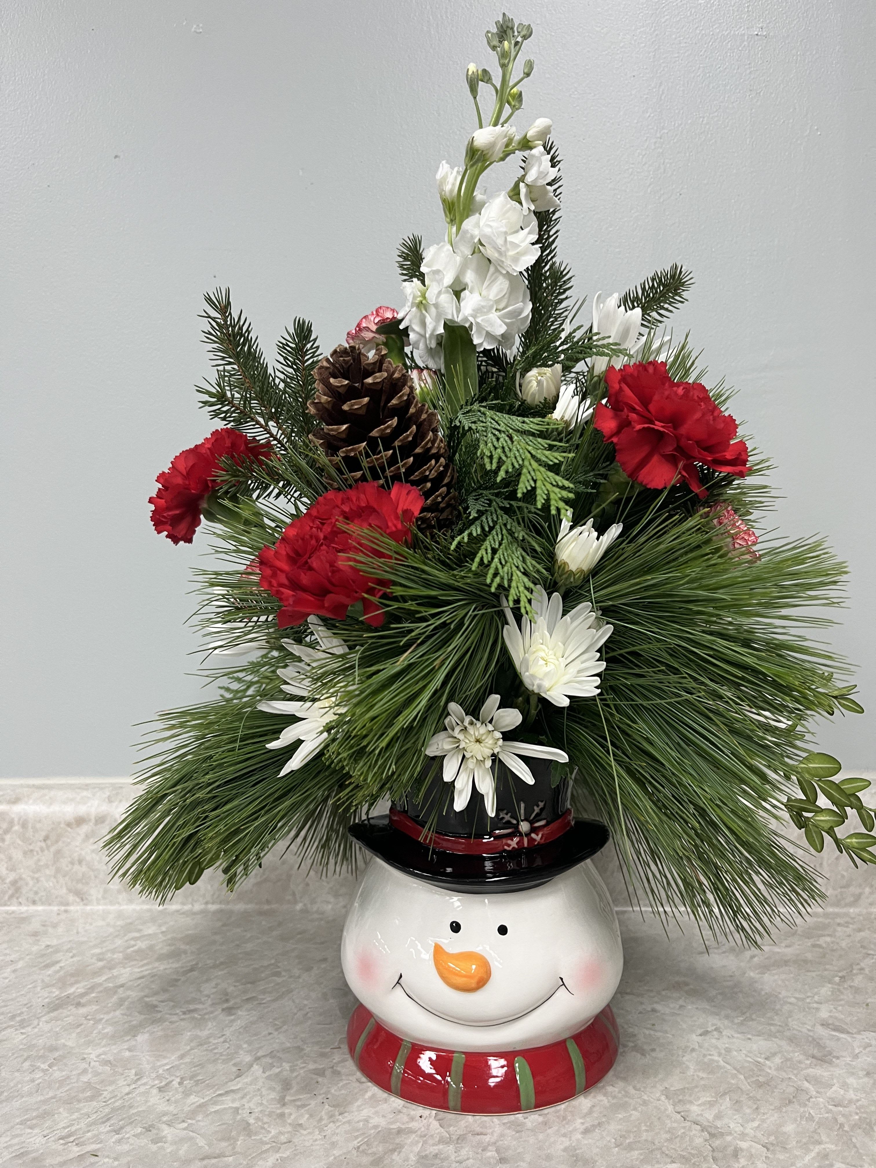 Joyful Snowman Bouquet - Ceramic snowman container with a christmasy mix of fresh flowers