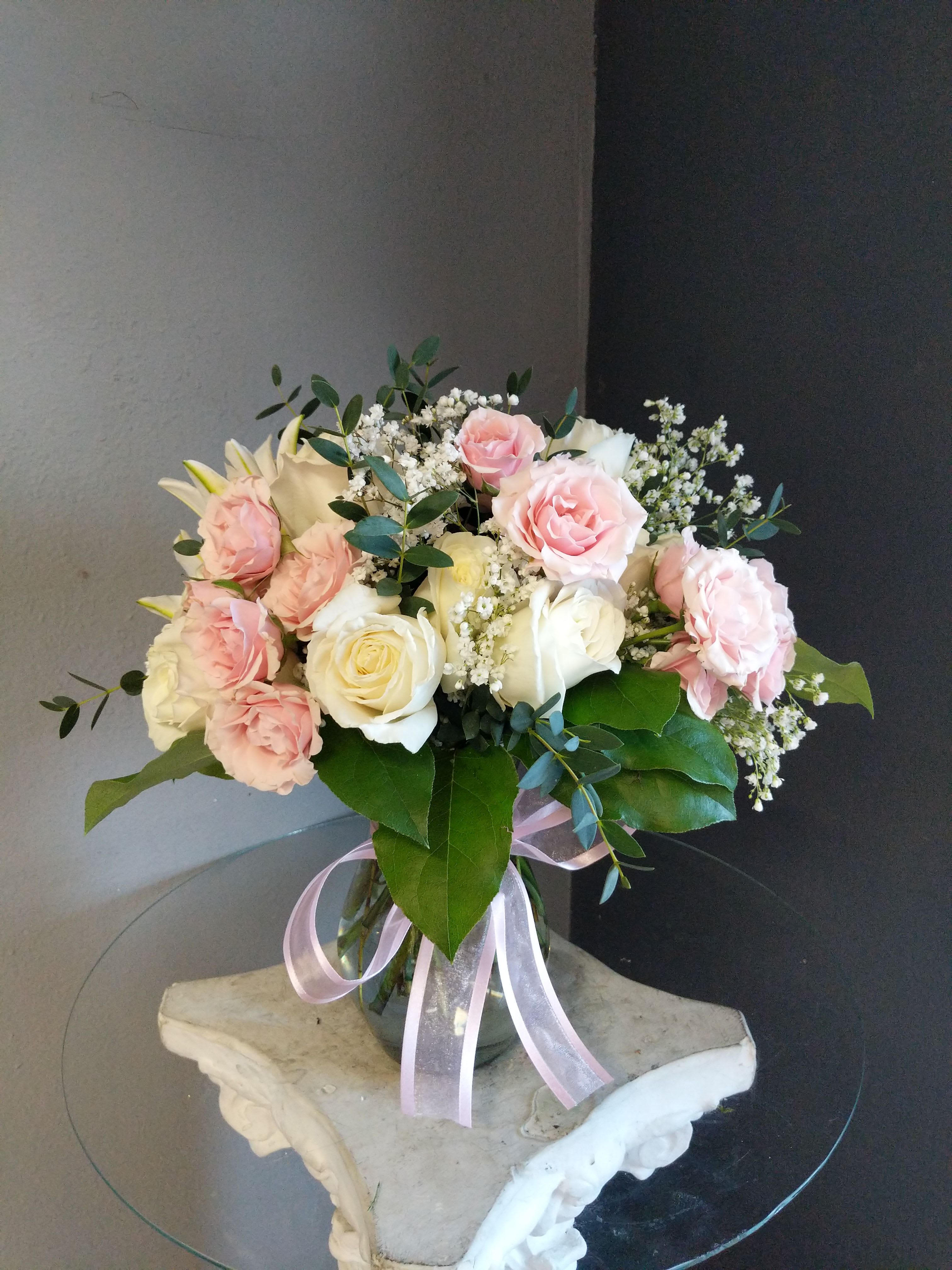 # 154 Winter Floral Arrangement  - A beautifully selected bunch of the freshest flowers in a vase uniquely arranged by hand.