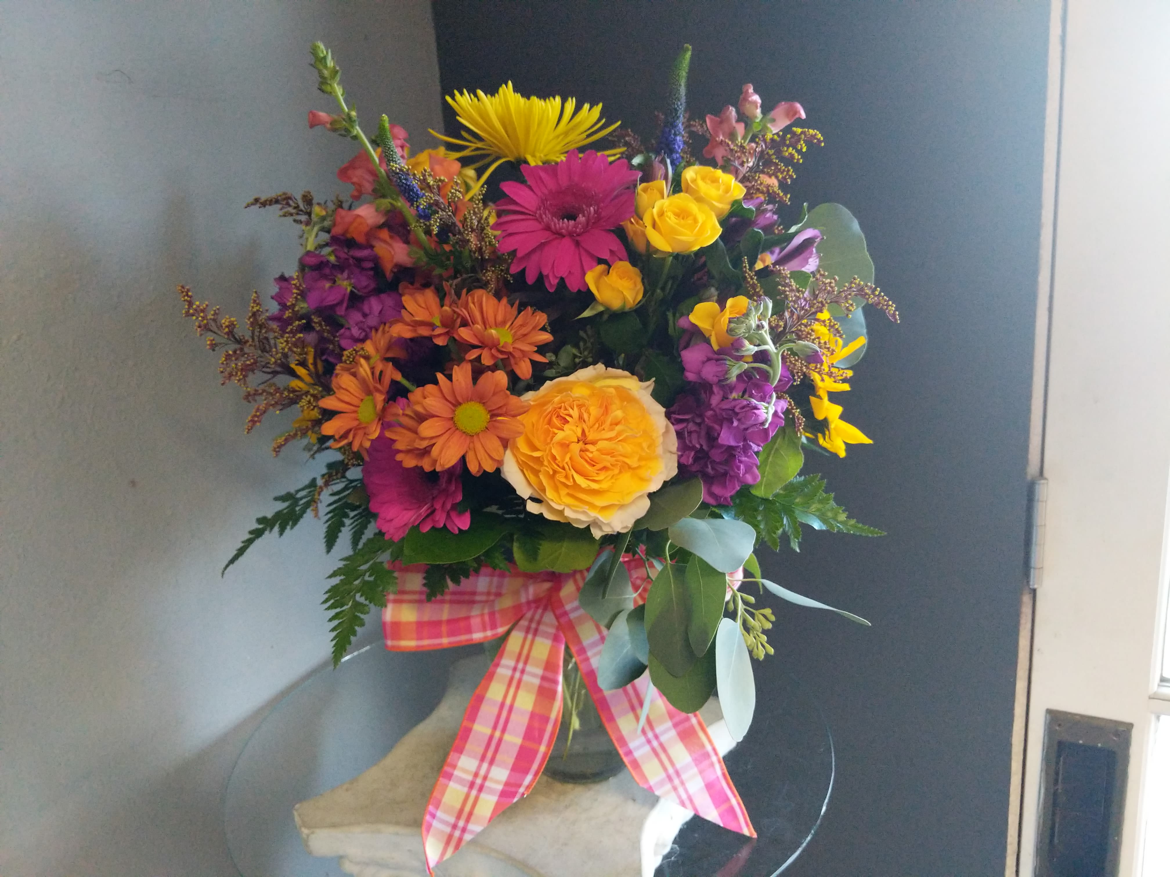 #133 Winter Floral Arrangement - A beautifully selected bunch of the freshest flowers in a vase uniquely arranged by hand.