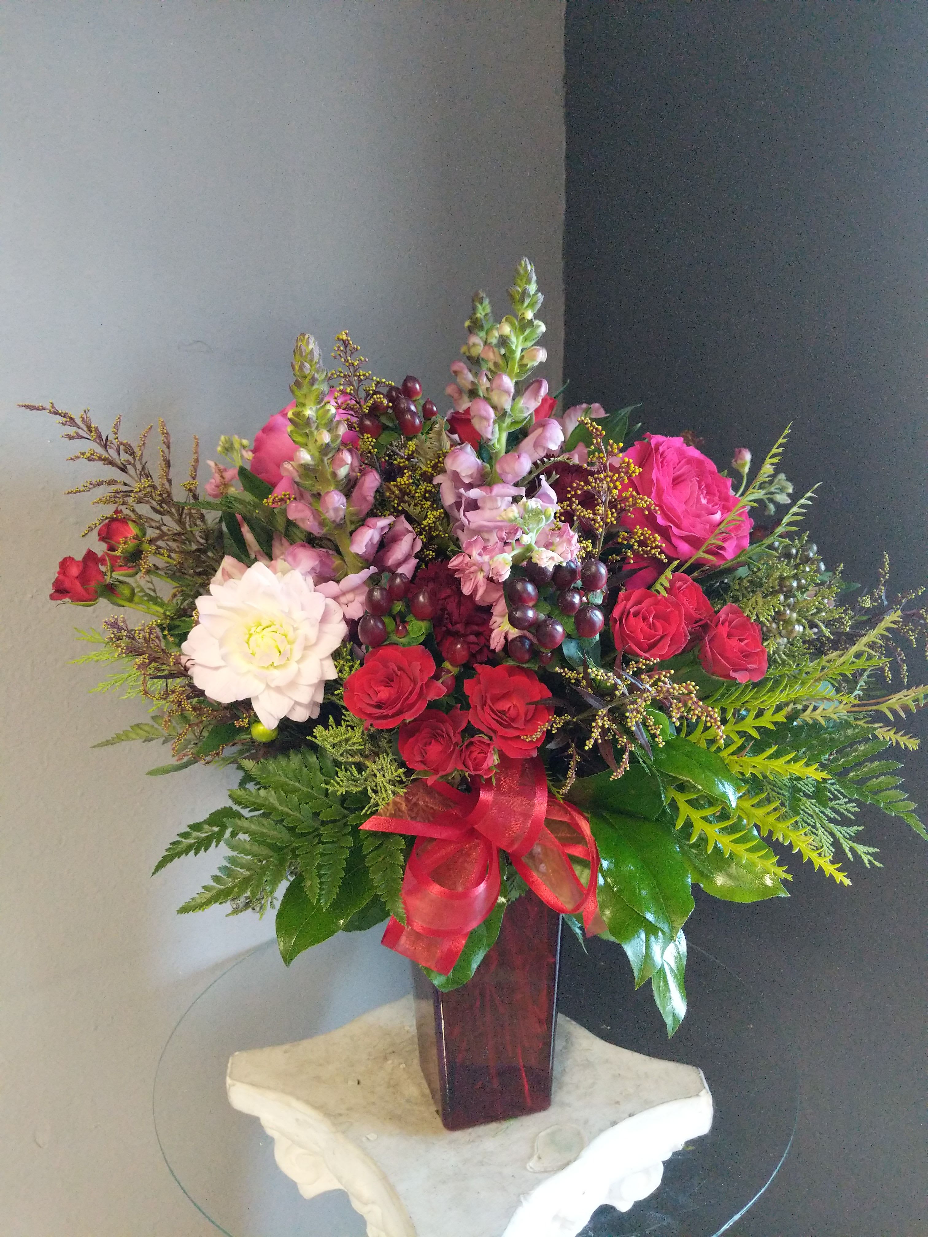 # 209 Winter Floral Arrangement - A beautifully selected bunch of the freshest flowers in a vase uniquely arranged by hand.