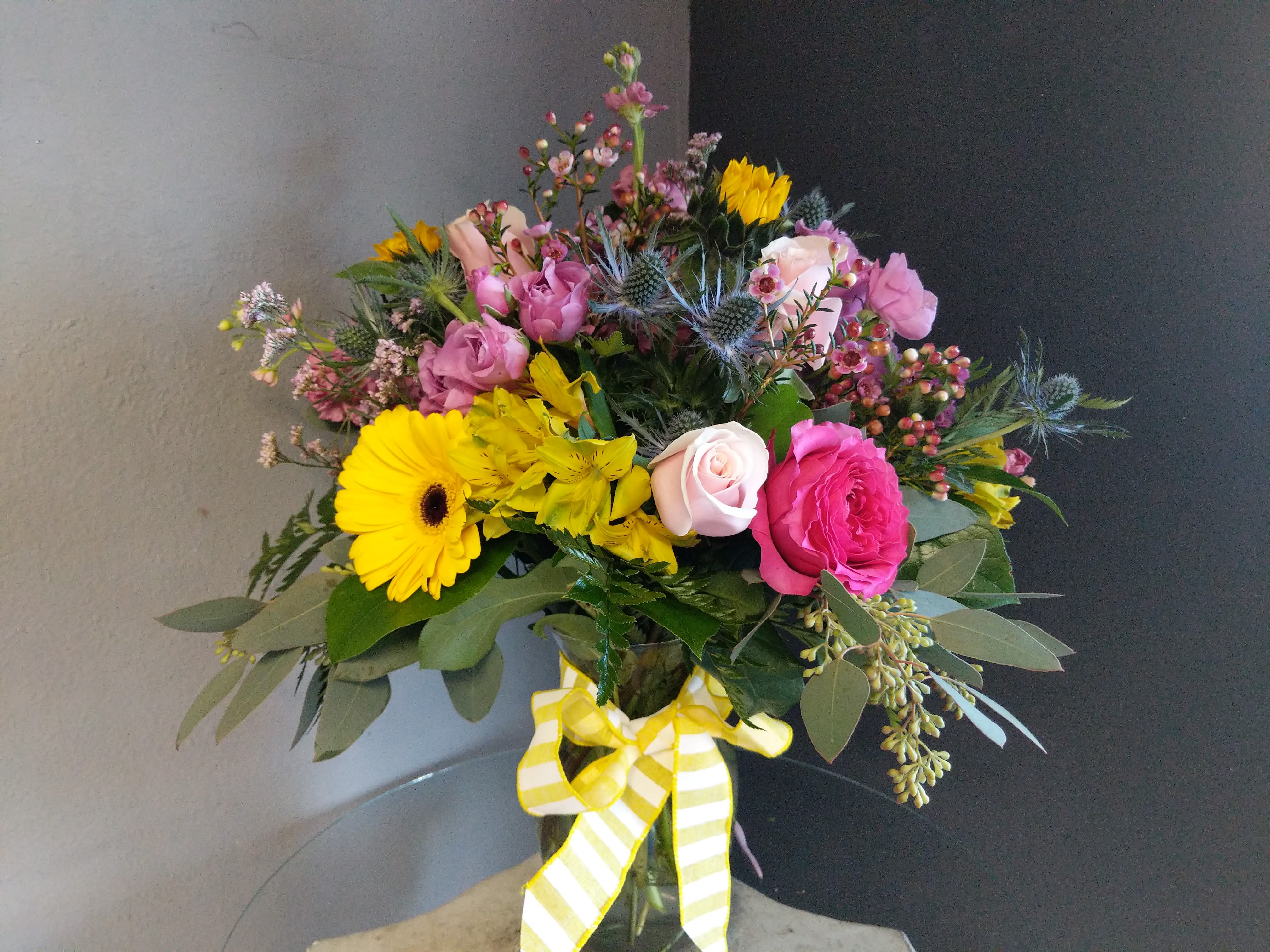 # 208 Winter Floral Arrangement  - A beautifully selected bunch of the freshest flowers in a vase uniquely arranged by hand.